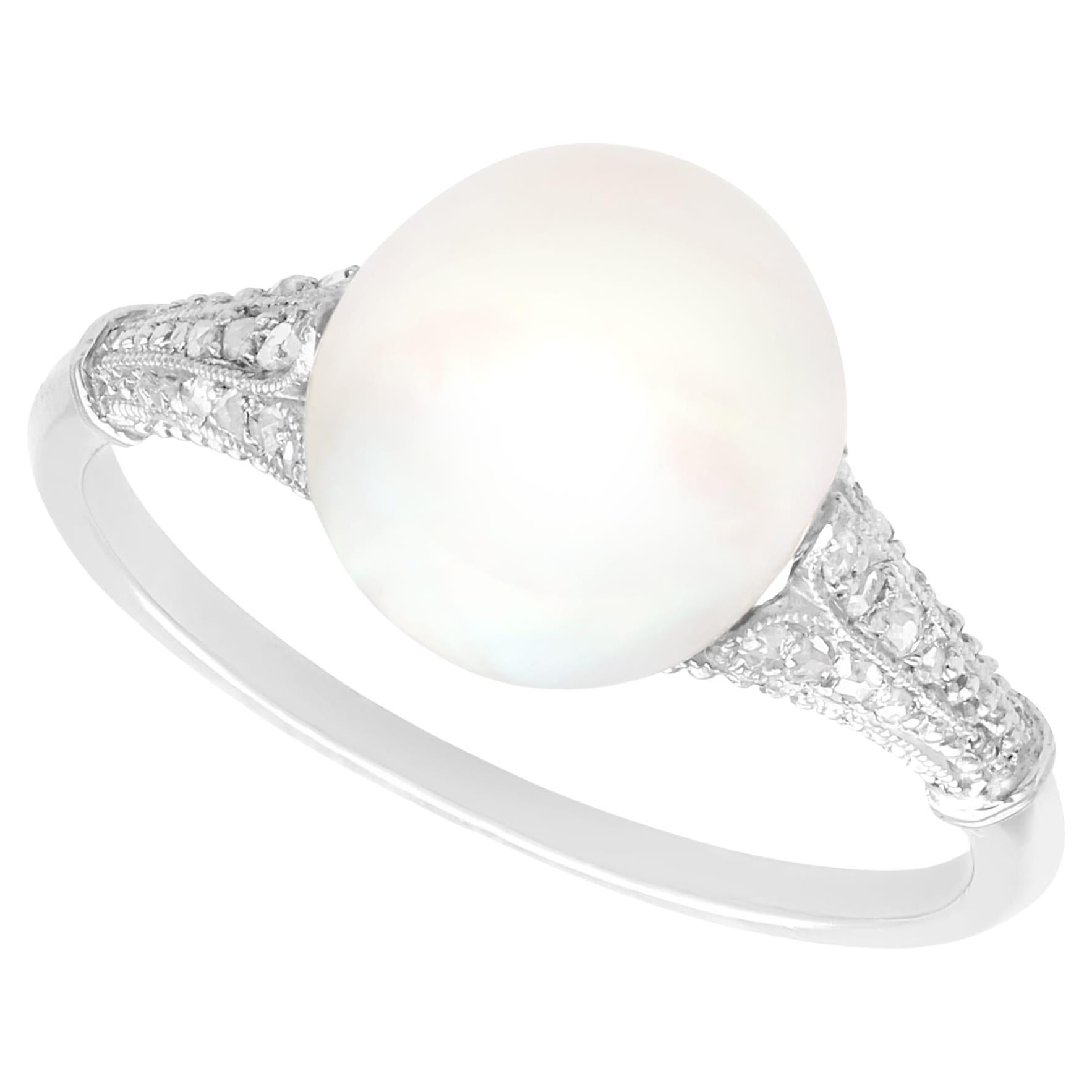 Anillo de compromiso antiguo de perlas de agua salada y diamantes en platino