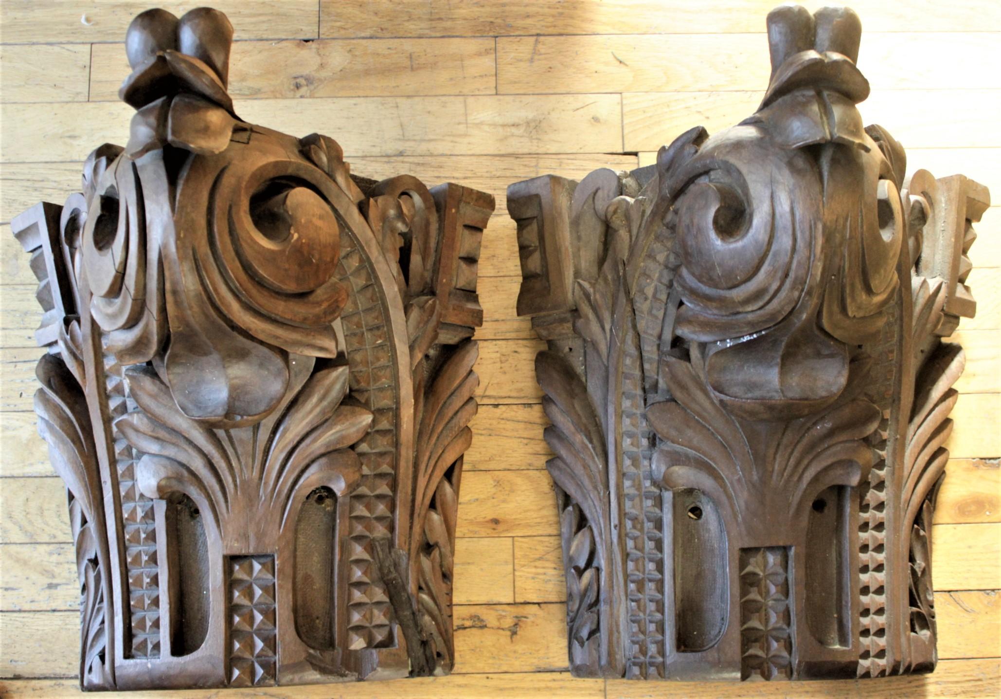 This matched pair of antique hand-carved walnut wall brackets were salvaged from an early Victorian house in Montreal, Canada. The brackets are unsigned, but presumed to have originated from Canada in approximately 1850 in the period Victorian