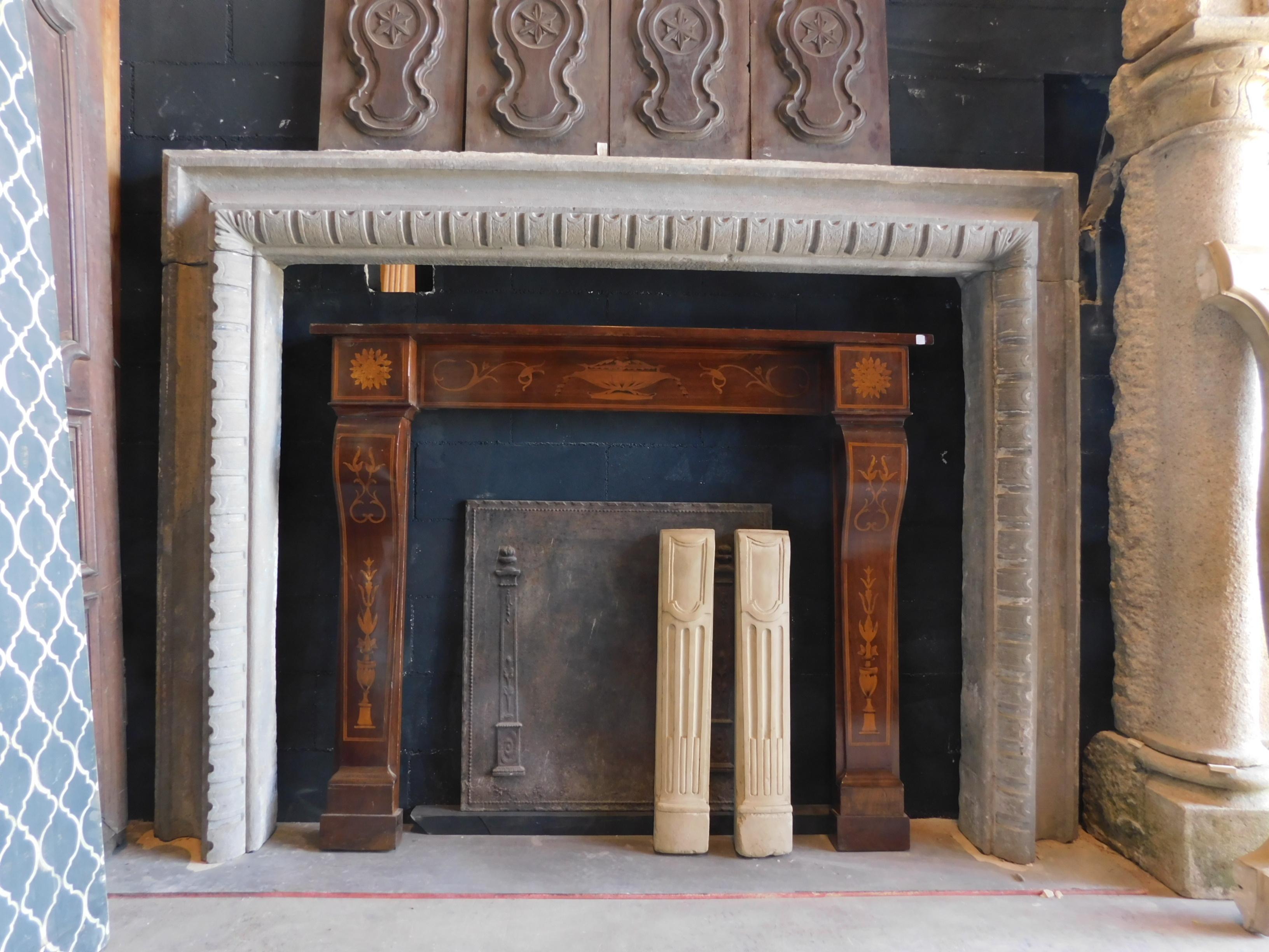 Antique Salvator Rosa fireplace in Serena stone, gray stone, hand-carved with Classic frame and teeth, classic fireplace frame that can be very appreciated even a modern interior given the geometric shape, original and sculpted from the 17th century