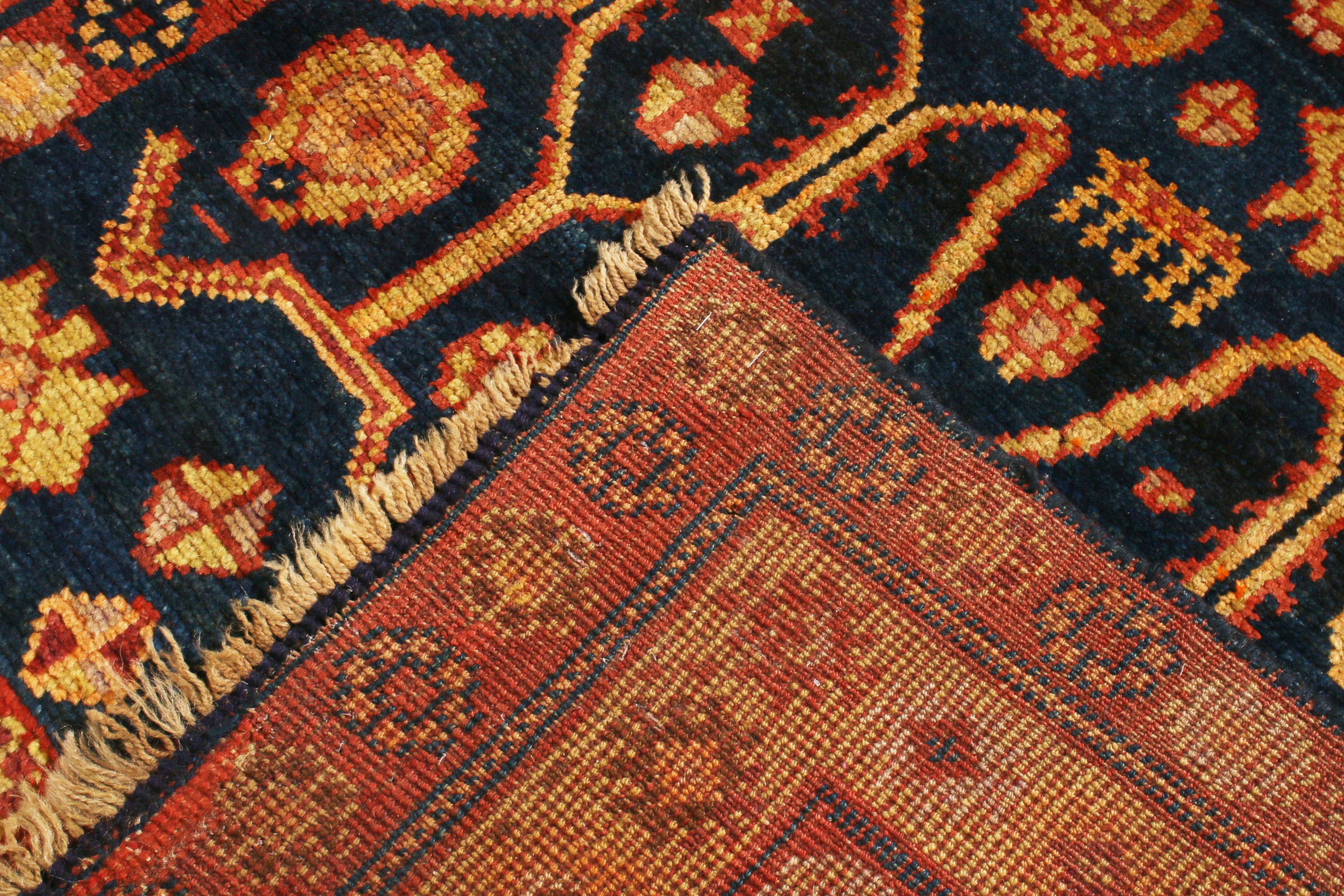 Early 20th Century Antique Samarkand Khotan Traditional Red and Blue Wool Rug