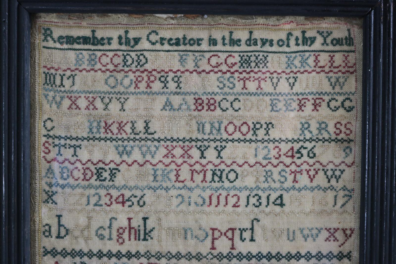 178? Sampler by Elizabeth Brenchley. The sampler is worked in silk on linen ground, in mainly cross stitch. Simple line border. Colours red, green, blue and silver. Alphabets A-Z in upper case and lower case and numbers 1-17. A truly special verse