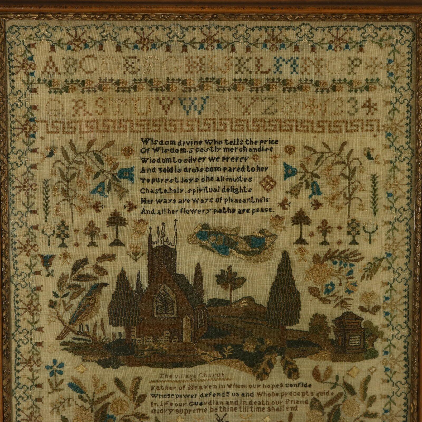 William IV Sampler, 1834, by Emma ManWaring. The sampler is worked in silk threads on a linen ground, mainly in cross stitch. Complex, meandering floral border. Colours brown, copper, gold, silver, blue and black. Alphabets A-Z in upper case and