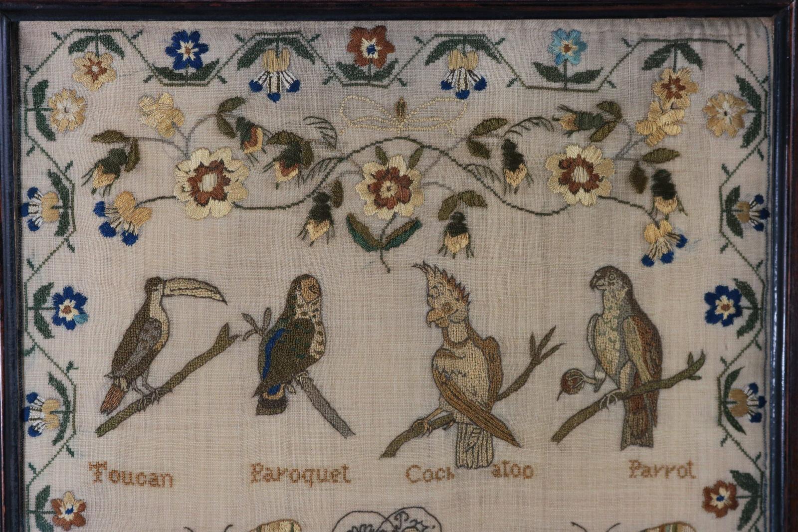 Sampler by Hannah Prince stitched in 1834. The sampler is worked in silk on linen ground, in a variety of fine stitches. Meandering floral border and wreath of extraordinary variety and detail. Colours blue, yellow, green, pale green, light brown,