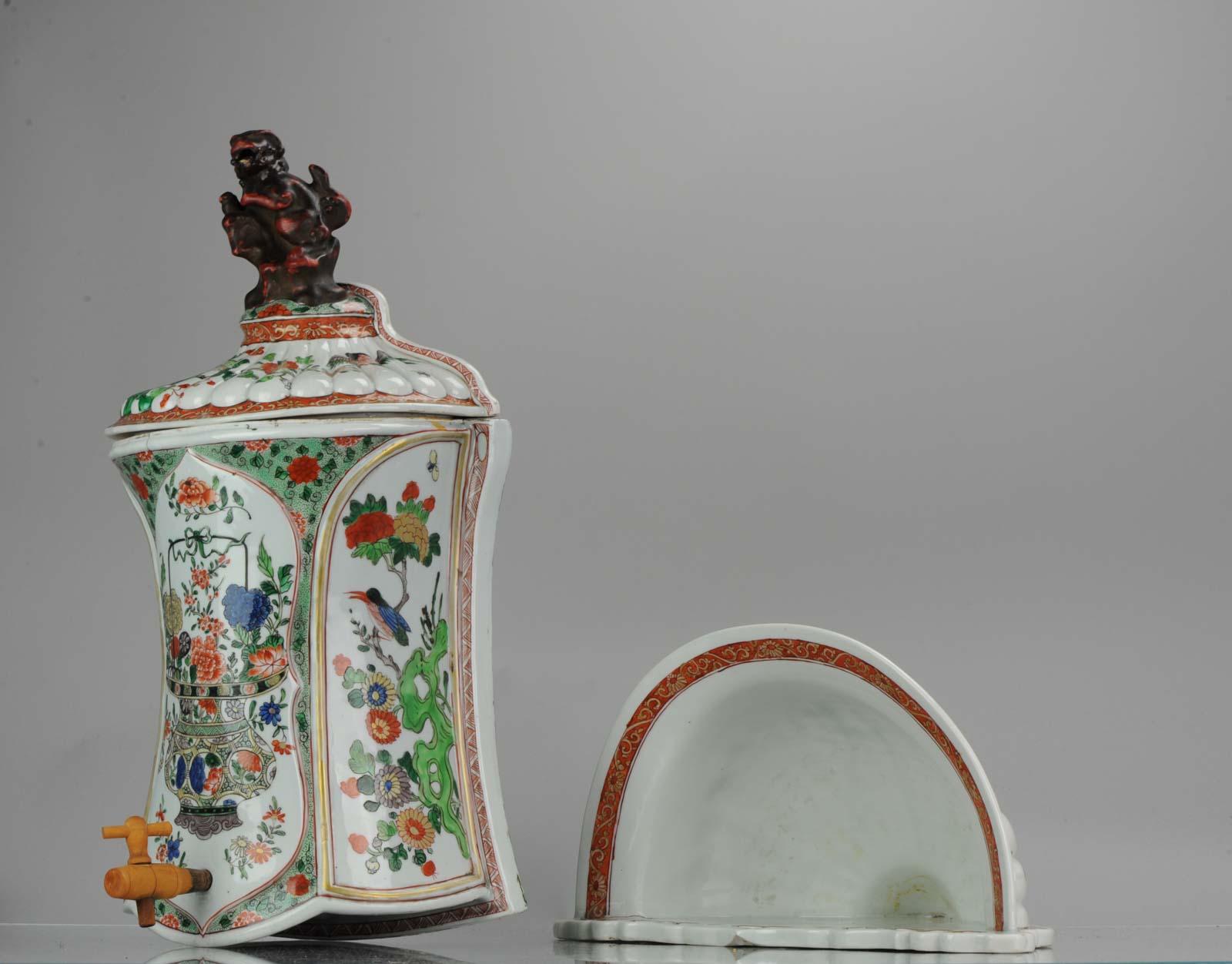 Cool Samson piece, strong colors. After Chinese famille verte example.

A very rare antique French Samson famille verte water fountain from the 19th century. Decorated with birds, flowers and crab. You can hang this piece on a wall, the holder