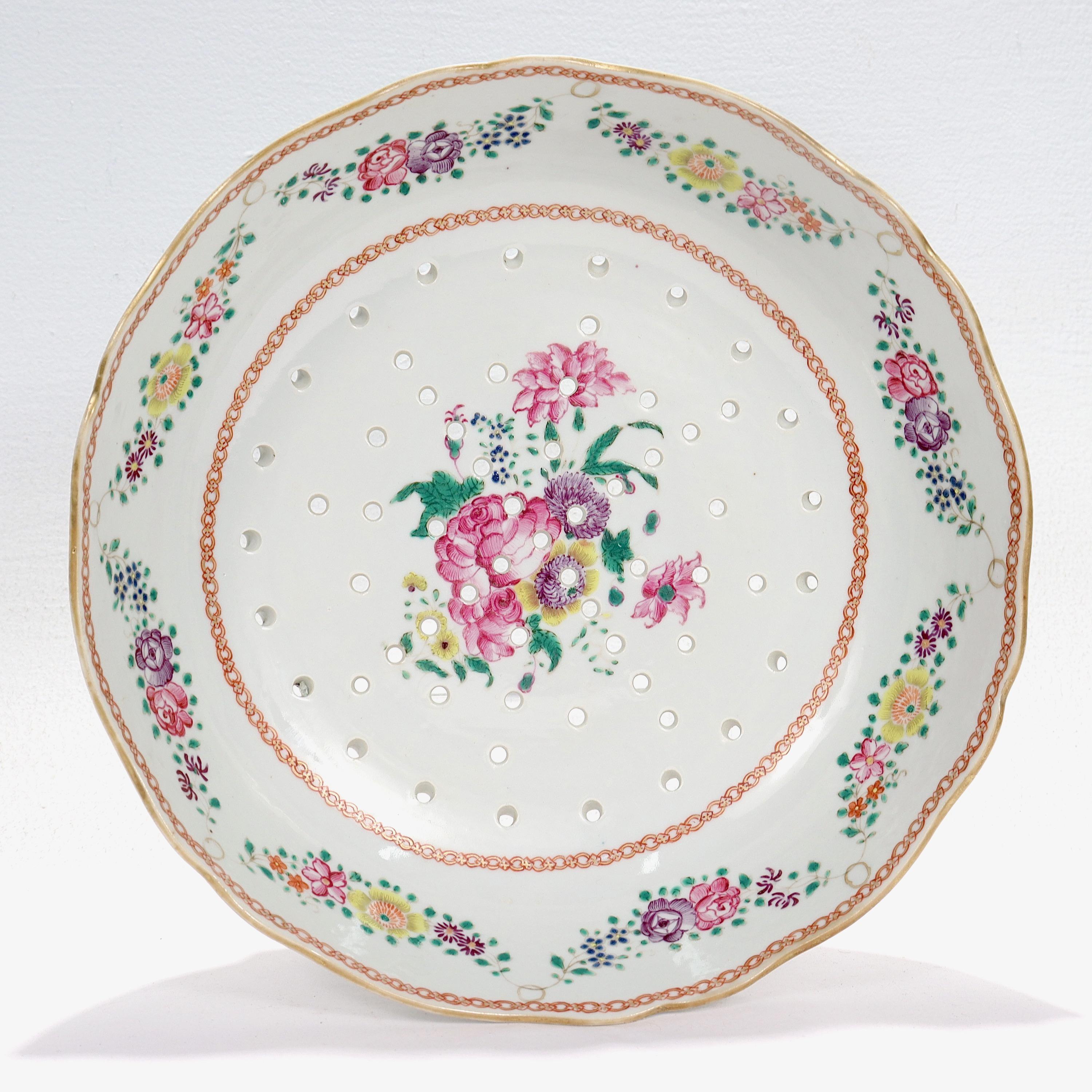 A fine antique reticulated porcelain fruit bowl.

By Edmé Samson et Cie.

With a reticulated rim and decorated throughout with painted flowers in yellow, pink, and purple along with gilt highlights. 

Simply a great porcelain