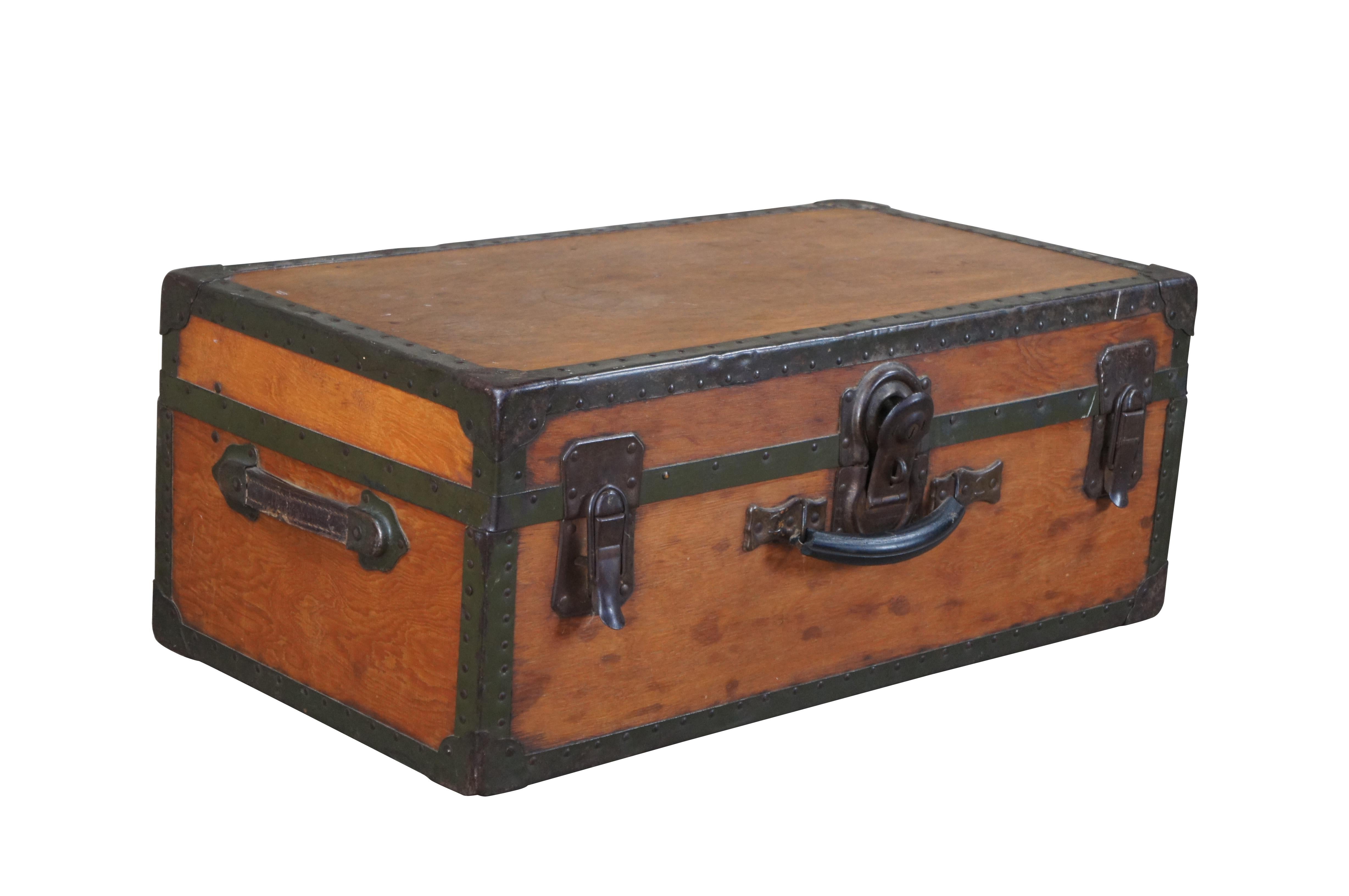 Antique Samson Shwayder Bros steamer trunk / storage chest / footlocker / suitcase / luggage / coffee table.  Made of pine featuring metal banded edges with rivets and leather handles.  Marked Samson and Shwayder Brother Detroit on lock.

The