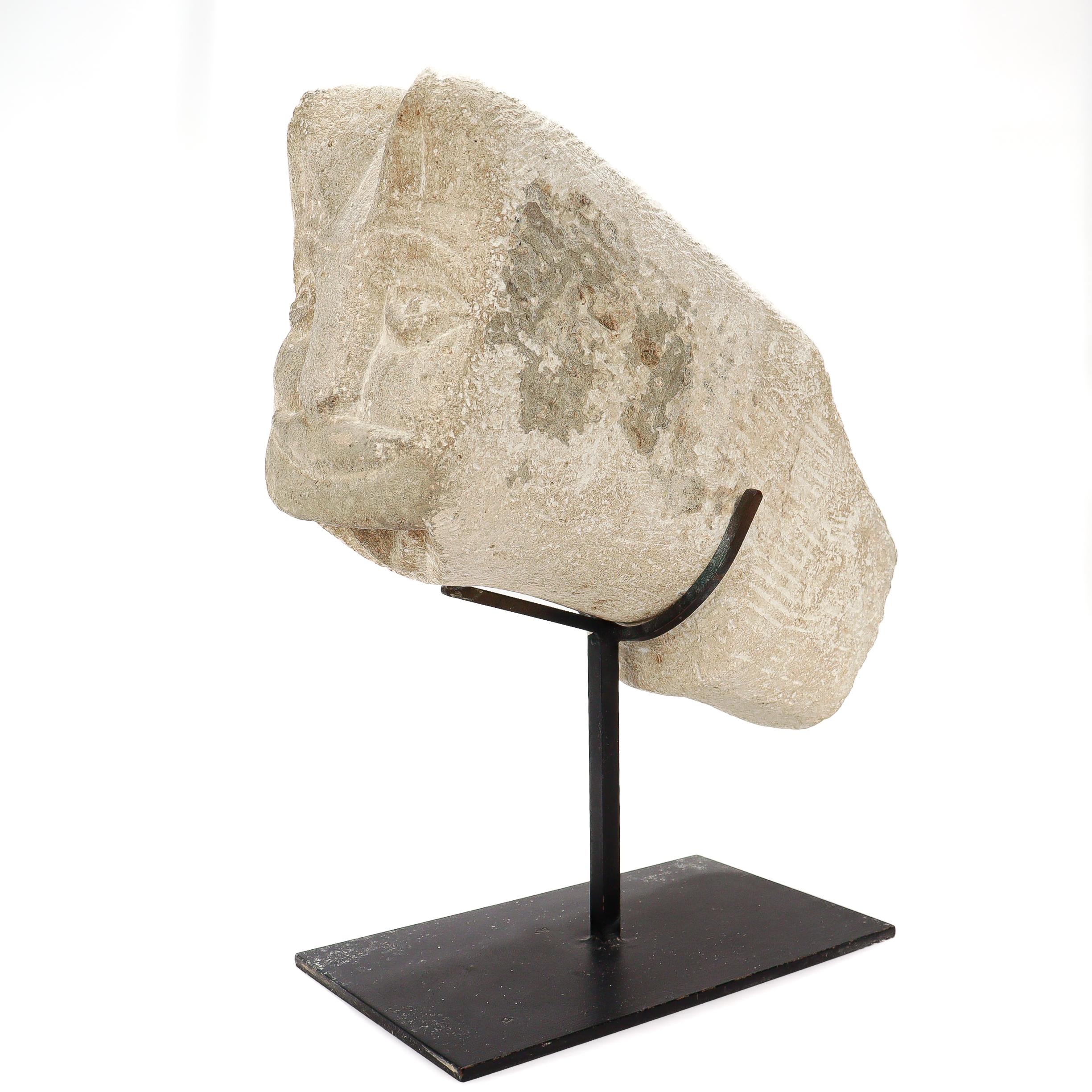 A fine antique figural fountainhead or architectural element.

In sandstone.

In the form of a cat.

Likely from the Ottoman Empire (1299 - 1922) but possibly from some other, older Eurasian civilization. 

Mounted in a metal museum mount.

Simply a