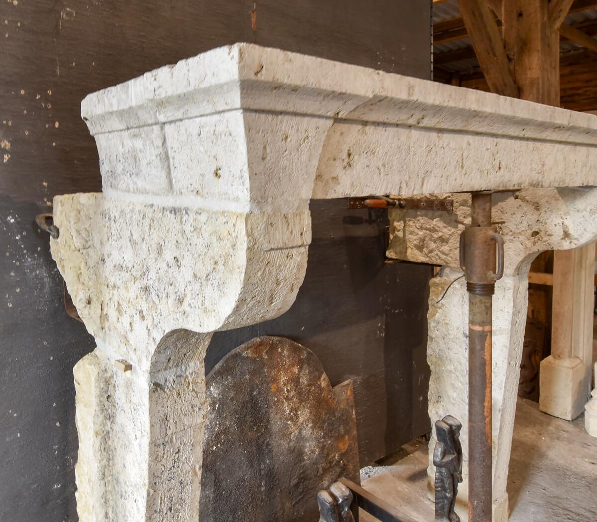 Large and antique sandstone fireplace mantelpiece type Compagnarde
from the 19th Century. To place around the chimney.