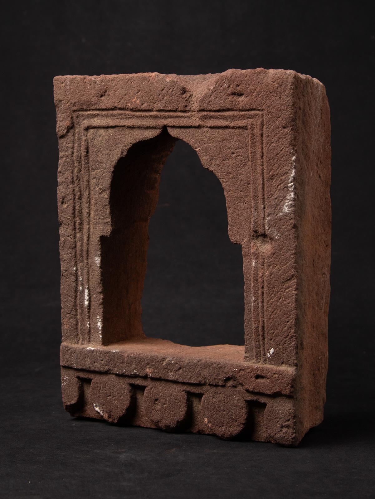 Introduce a piece of history and spiritual artistry to your collection with this Antique Sandstone Temple from India, an exquisite 19th-century artifact that reflects the grandeur and devotion of traditional Indian craftsmanship. Carved from