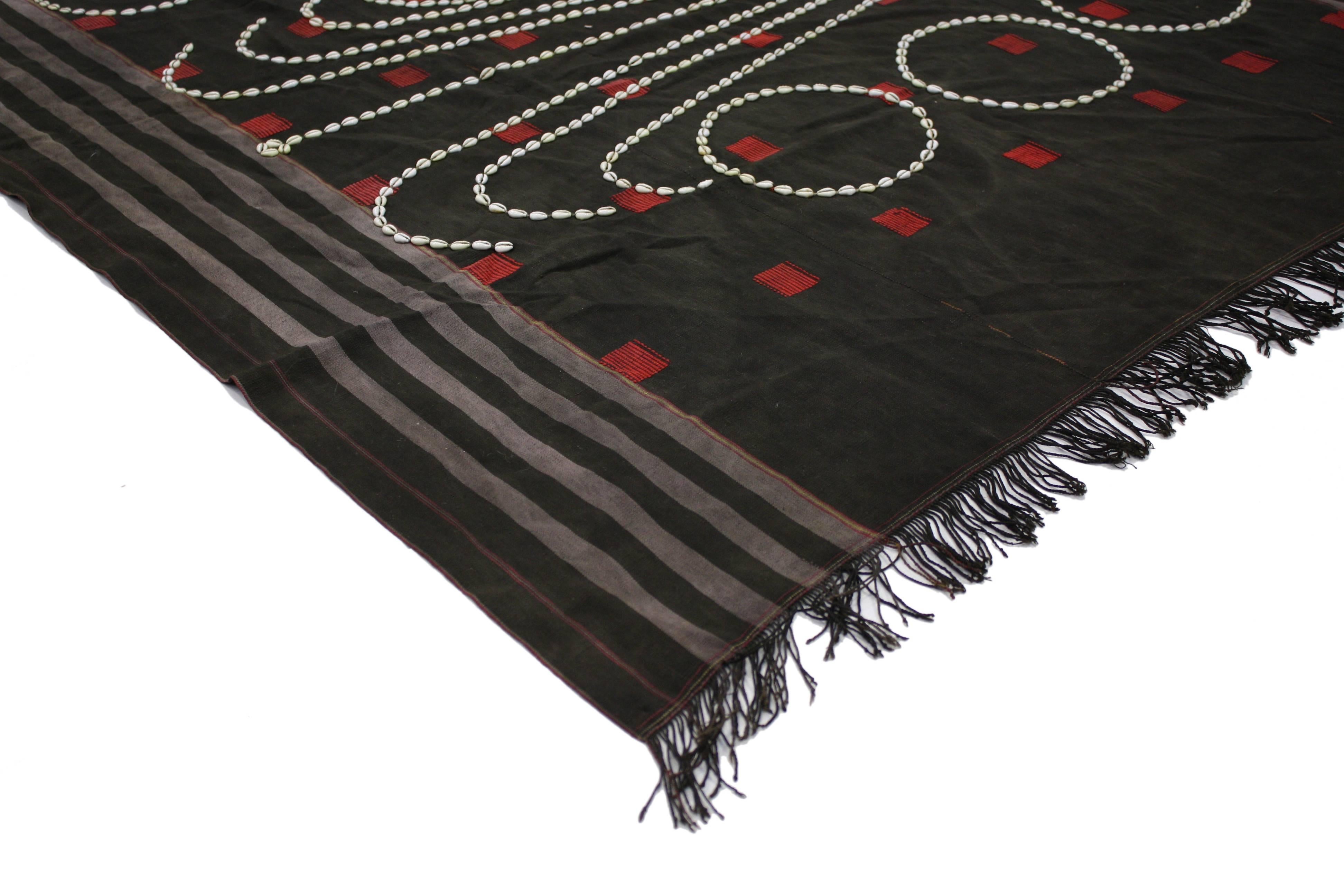 76646, antique Sangtam Naga Tribe Supong Warrior Shawl with Cowrie shell circles. This antique naga warrior Supong shawl was most likely worn by headman (headhunter) from the Sangtam Tribe of Nagaland. This ceremonial body cloth was honored and very