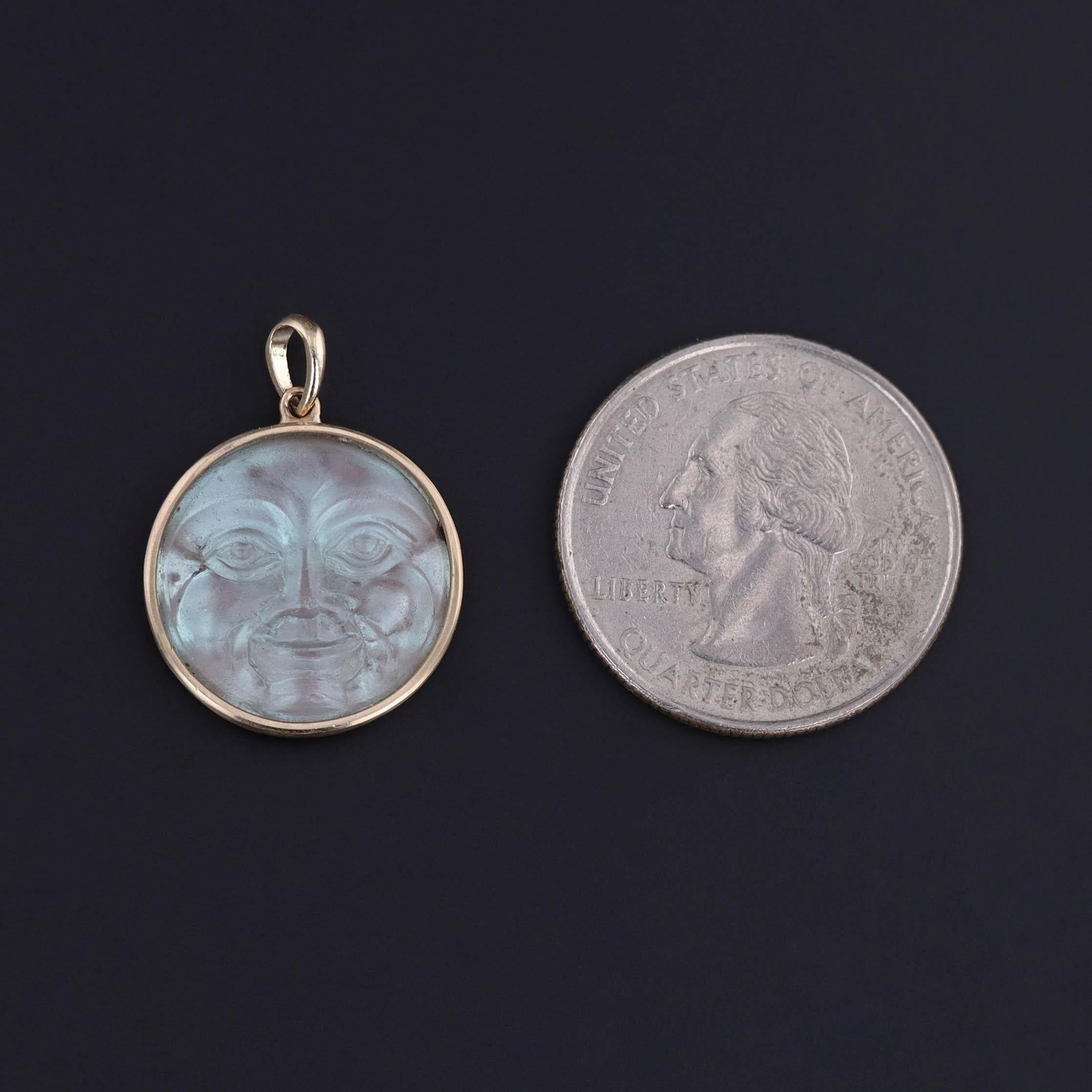 Ethereal and rare, this antique pendant features a mystical saphiret glass “Man in the Moon”, glowing with its signature iridescence. Originally part of an 1890s bookmark, this extraordinary piece was expertly converted by our jeweler, who added a