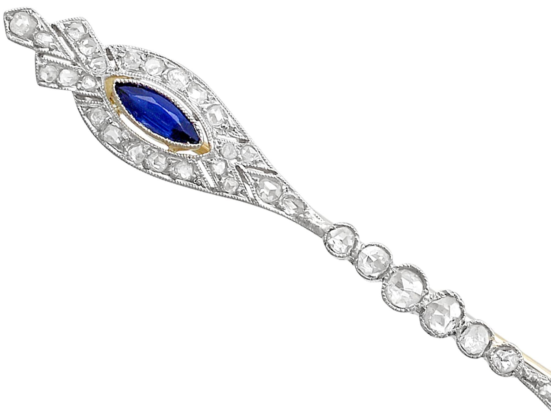 An impressive antique 0.58 carat sapphire and 1.19 carat diamond, 18 karat yellow and white gold bar brooch; part of our diverse antique jewelry and estate jewelry collections.

This fine and impressive antique sapphire and diamond brooch has been