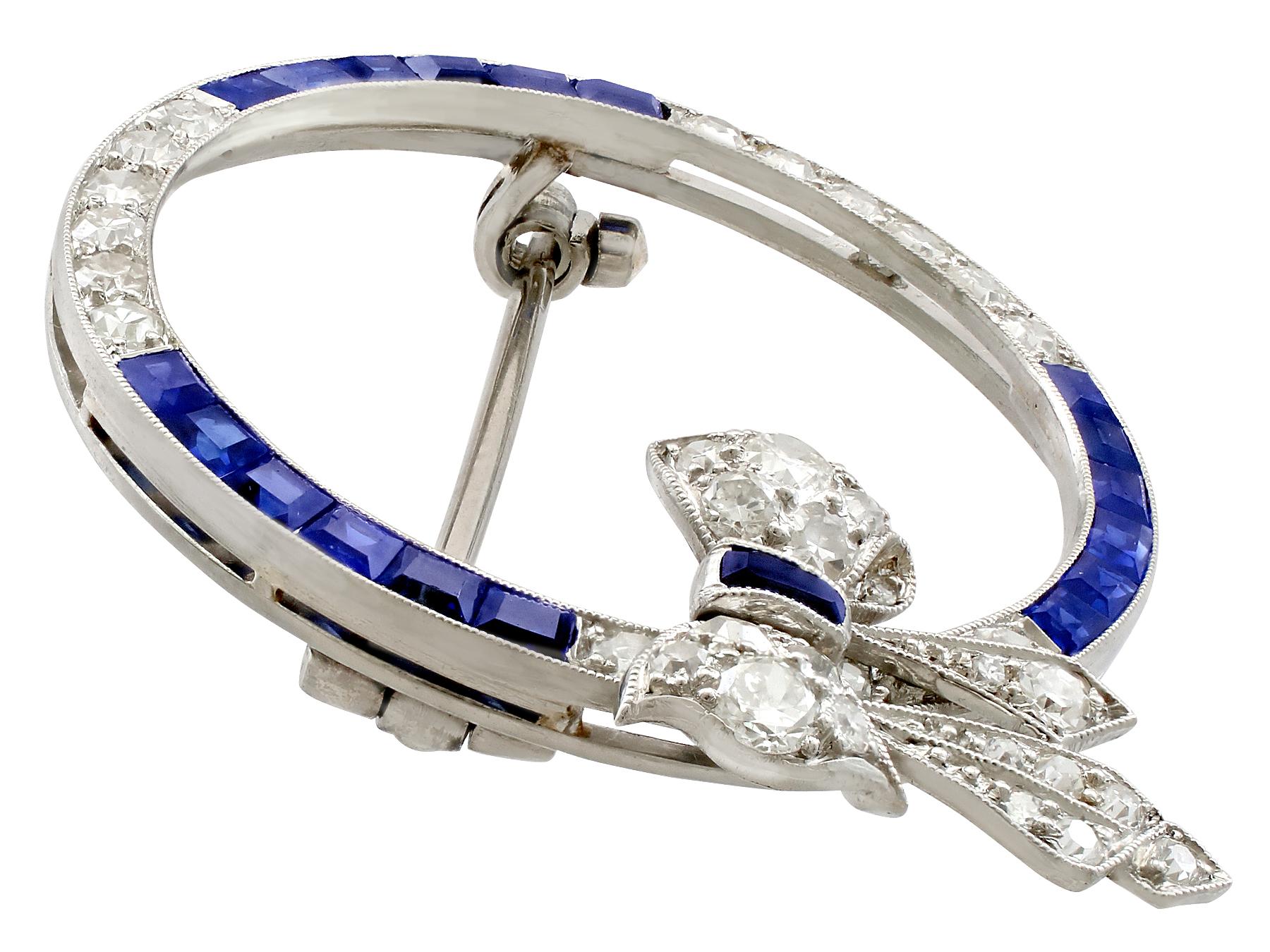 Antique Sapphire and 1.27 Carat Diamond Platinum Bow Brooch, circa 1910 In Excellent Condition In Jesmond, Newcastle Upon Tyne