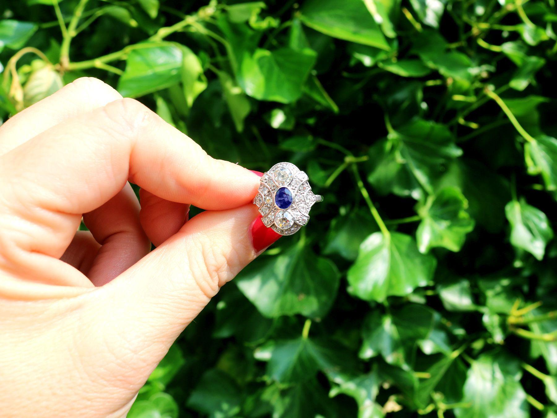 A stunning, fine and impressive antique 0.63 carat blue sapphire and 1.64 carat diamond, 18 karat white gold cocktail ring; part of our diverse antique jewelry collections

This stunning, fine and impressive blue sapphire and diamond ring has been