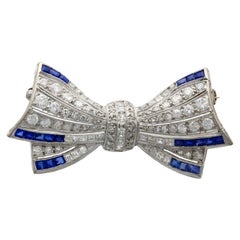 Antique Sapphire and 3.10 Carat Diamond White Gold Bow Brooch