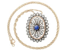 Antique Sapphire and 3.60 Carat Diamond Yellow Gold Pendant Brooch
