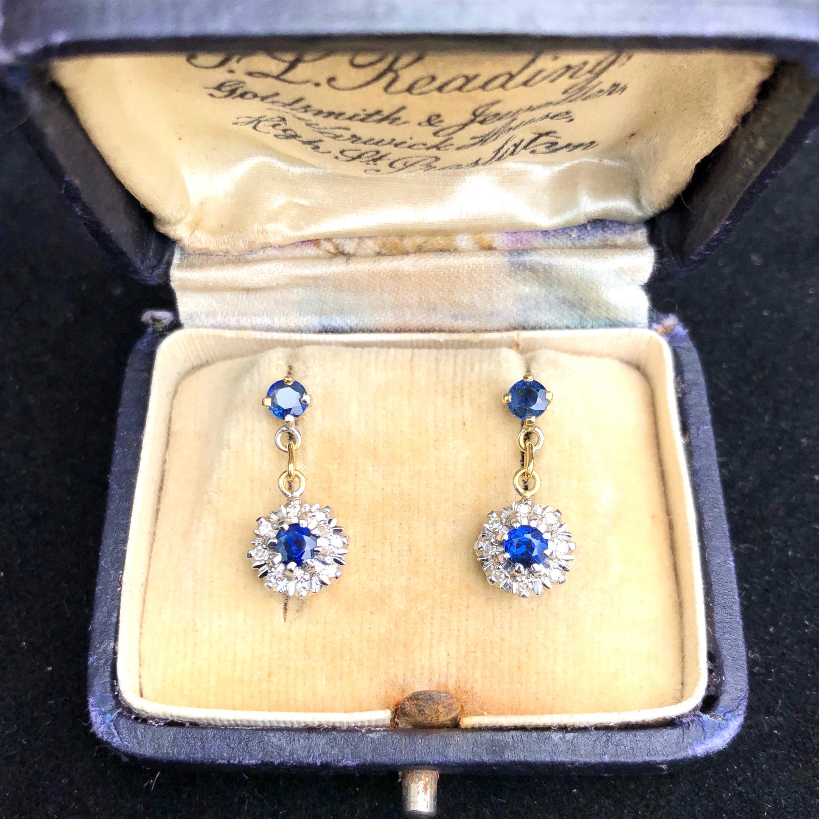 At the centre of each cluster sits a deep delicious blue sapphire and surrounding these gorgeous stones are sparkling diamonds set in detailed settings. The stones are set in platinum and the rest of the earrings are modelled in 18ct gold.

Weight: