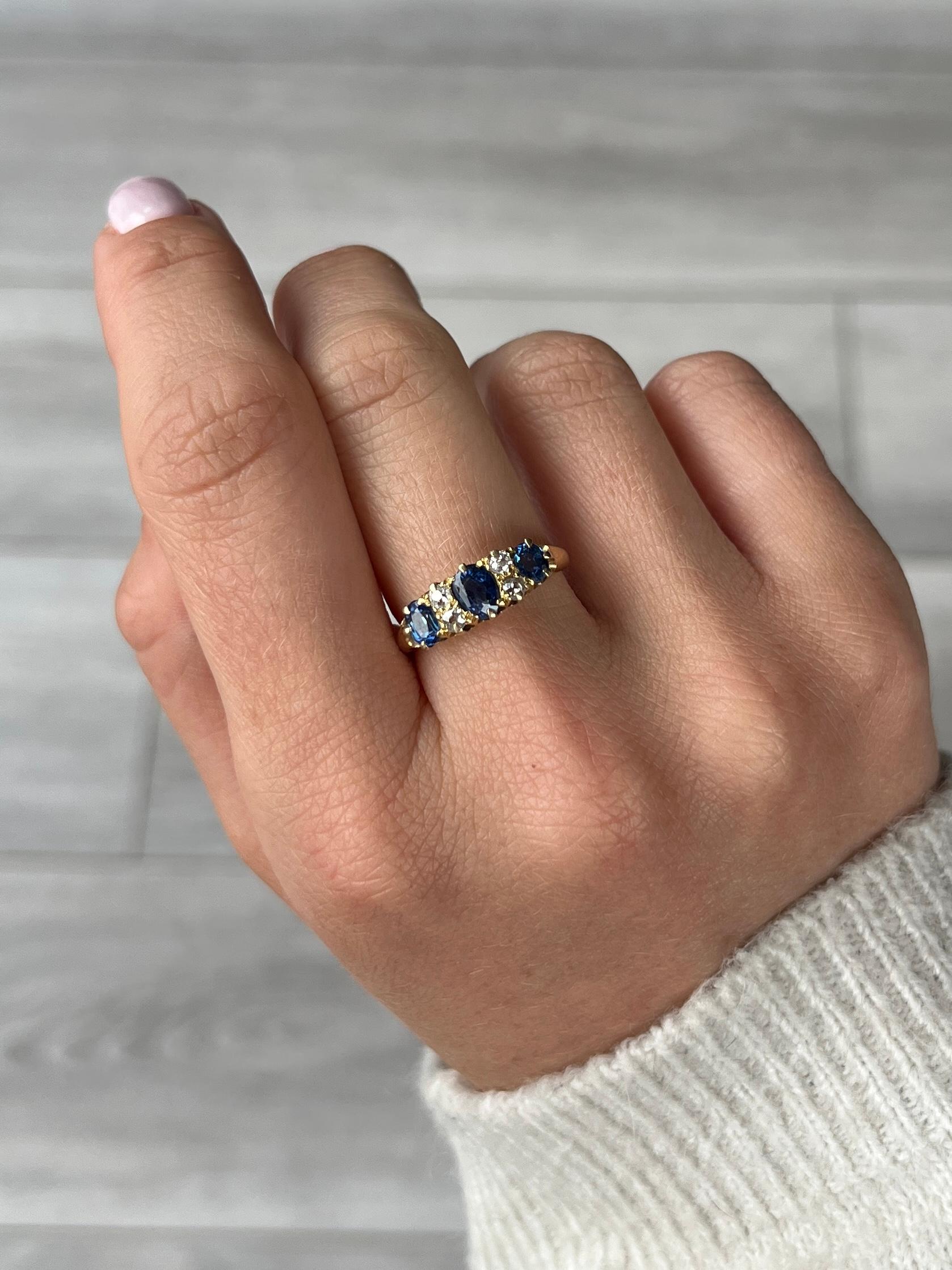 Round Cut Antique Sapphire and Diamond 18 Carat Gold Three Stone Ring For Sale