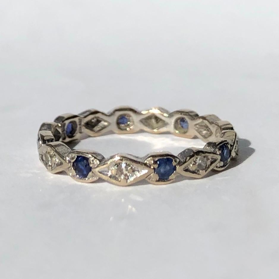 This sweet eternity band holds a total of eight sapphires and eight diamonds. The sapphires measure 4pts and the diamond measure 2pts. The ring is modelled in 18ct white gold.

Ring Size: M or 6 1/4
Band Width: 3mm 

Weight: 2.5g