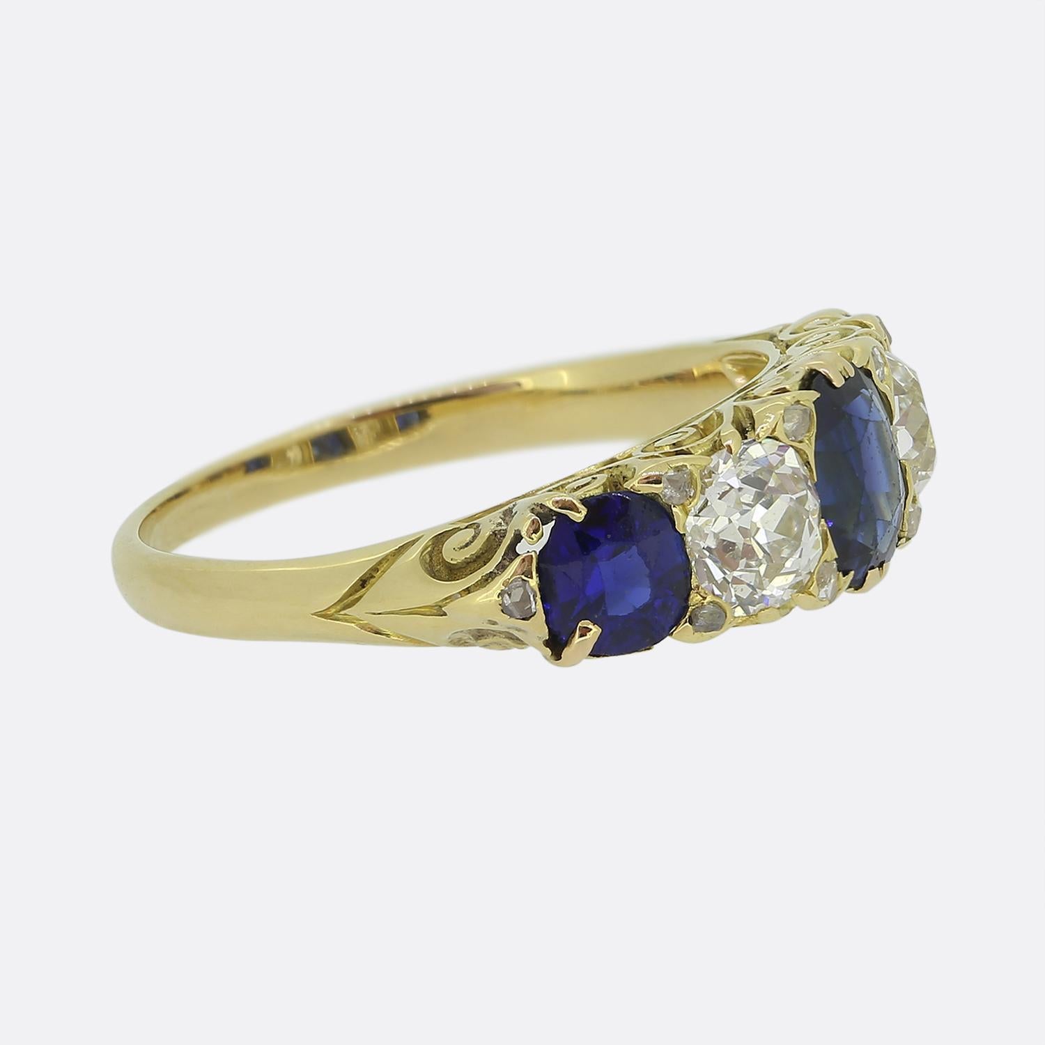 Here we have an elegant sapphire and diamond five stone ring dating back to the Edwardian era. The ring has been crafted in 18ct yellow gold and the stones are an excellent quality. The sapphires are a rich royal blue which is nicely contrasted by