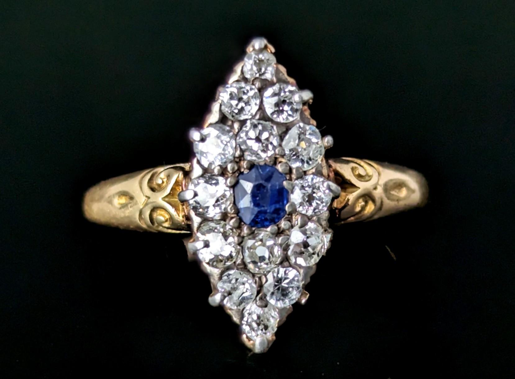 This antique Victorian Sapphire and Diamond navette ring was made to be noticed.

The sparkle that exudes from the glistening old cut diamonds is simply magical and this type of sparkle can only be found with old cut diamonds.

The ring, a navette