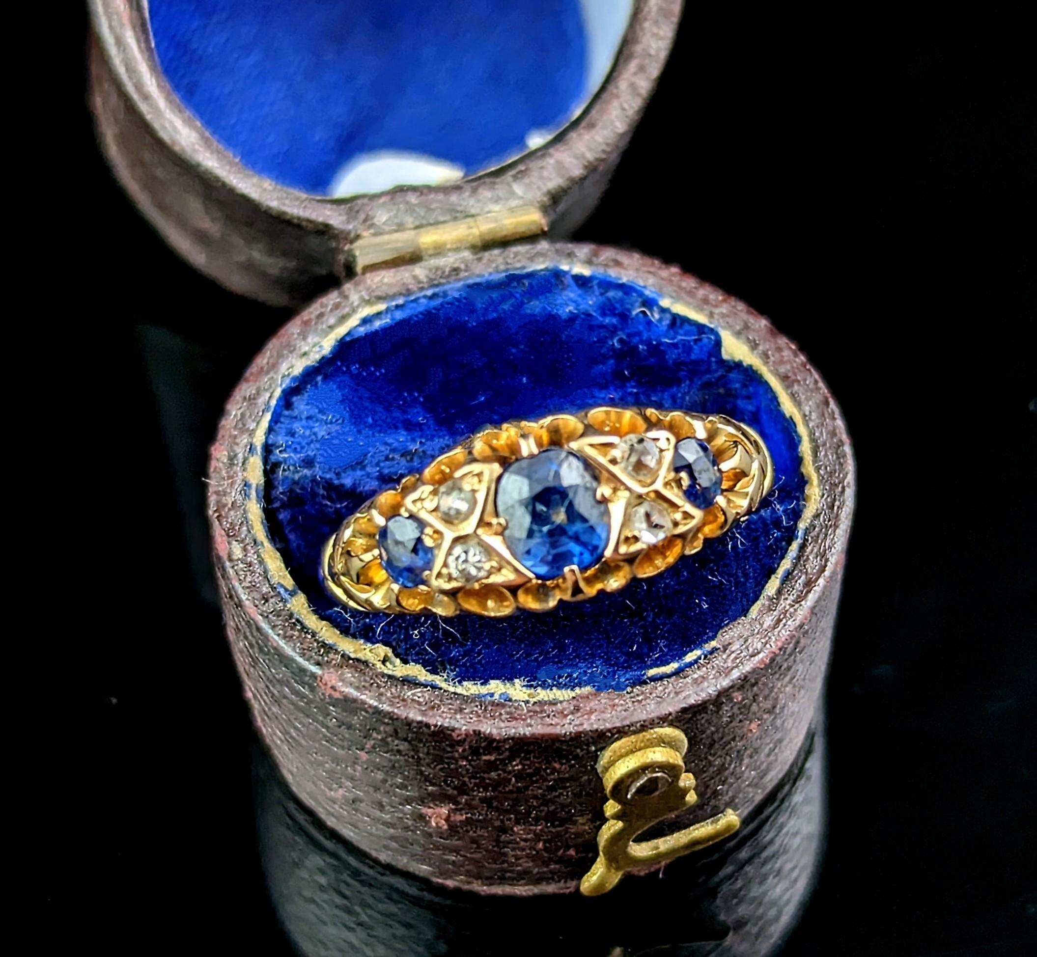 If you are looking for the perfect sapphire ring look no further! This stunning antique, Victorian era, Sapphire and Diamond ring is a simply a dream.

Crafted in rich 18ct yellow gold this ring has a central trio of sapphires with a vibrant rich