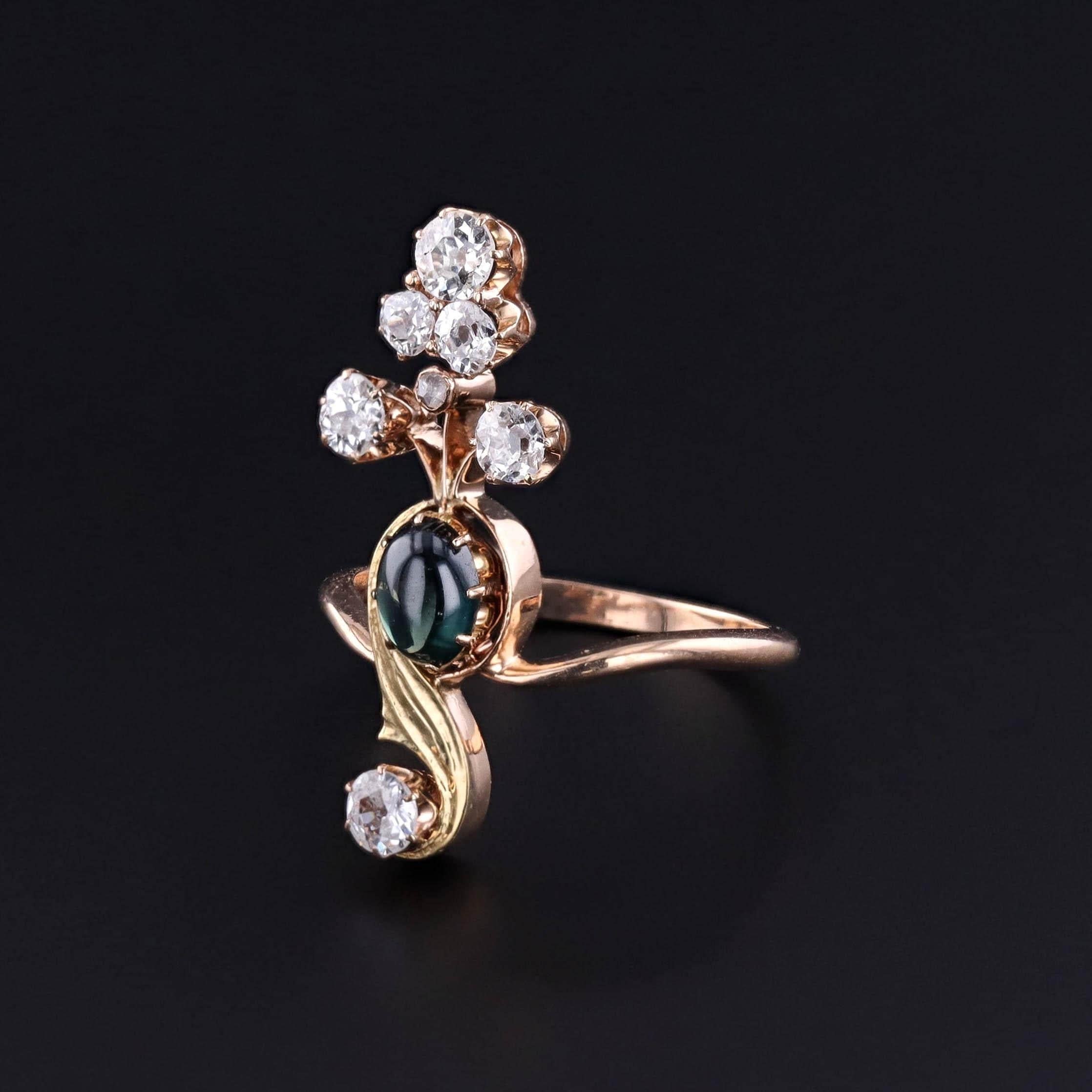 Antique Belle Epoque Sapphire Ring: This antique ring (circa 1908-1920) features a natural untreated grayish blue sapphire and seven prong set old mine cut diamonds.

The 1.00ct sapphire is believed to be of Kasmir origin, as it exhibits a foggy
