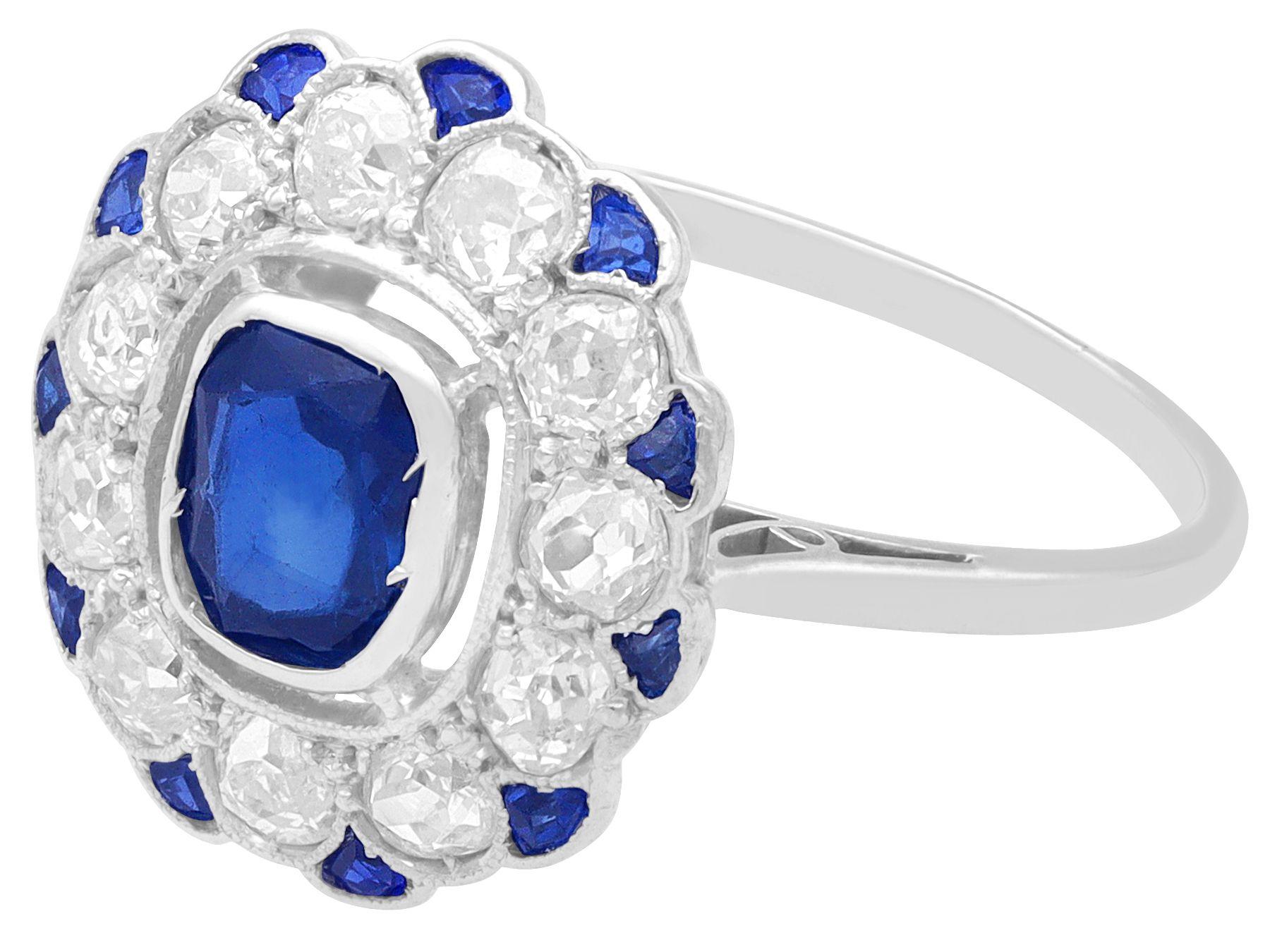 Cushion Cut Antique Sapphire and Diamond White Gold Cluster Ring, Circa 1920 For Sale