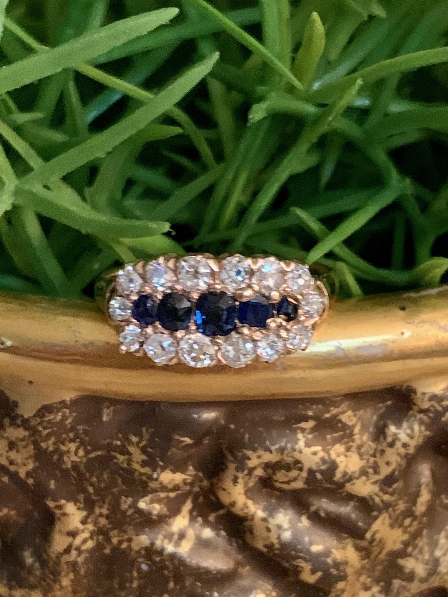This antique 18 karat yellow Gold ring features five 2.5-3mm blue Sapphires and fourteen 2-2.5mm mine cut Diamonds, toatling approximately .50tcw.
Average Grade: SI(2)-I, -H

Size: 7
Weight: 3.2 grams


