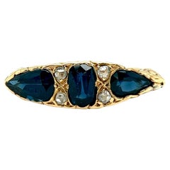 Antique Sapphire Diamond 18 Karat Yellow Gold Three Stone Ring