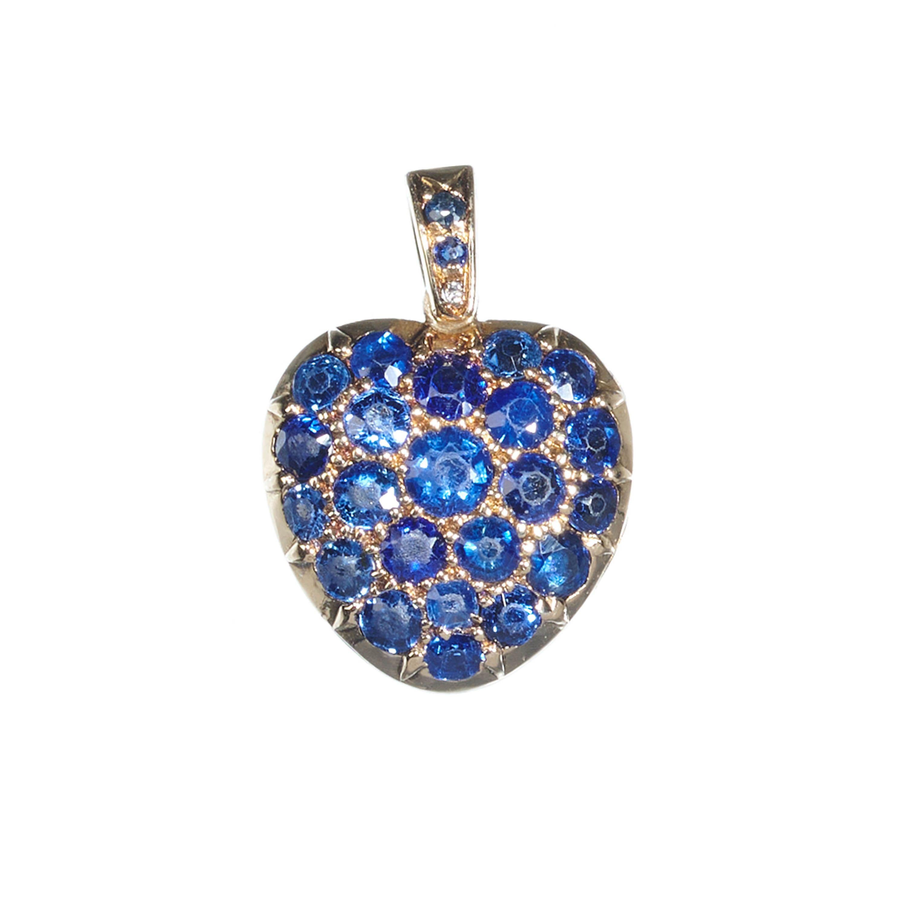 An antique sapphire and diamond double sided locket, one side is pavé set with sapphires and sapphires set in the bail, in gold settings, the other side is pavé set with old-cut diamonds, with an Edwardian-cut diamond in the centre and diamonds in