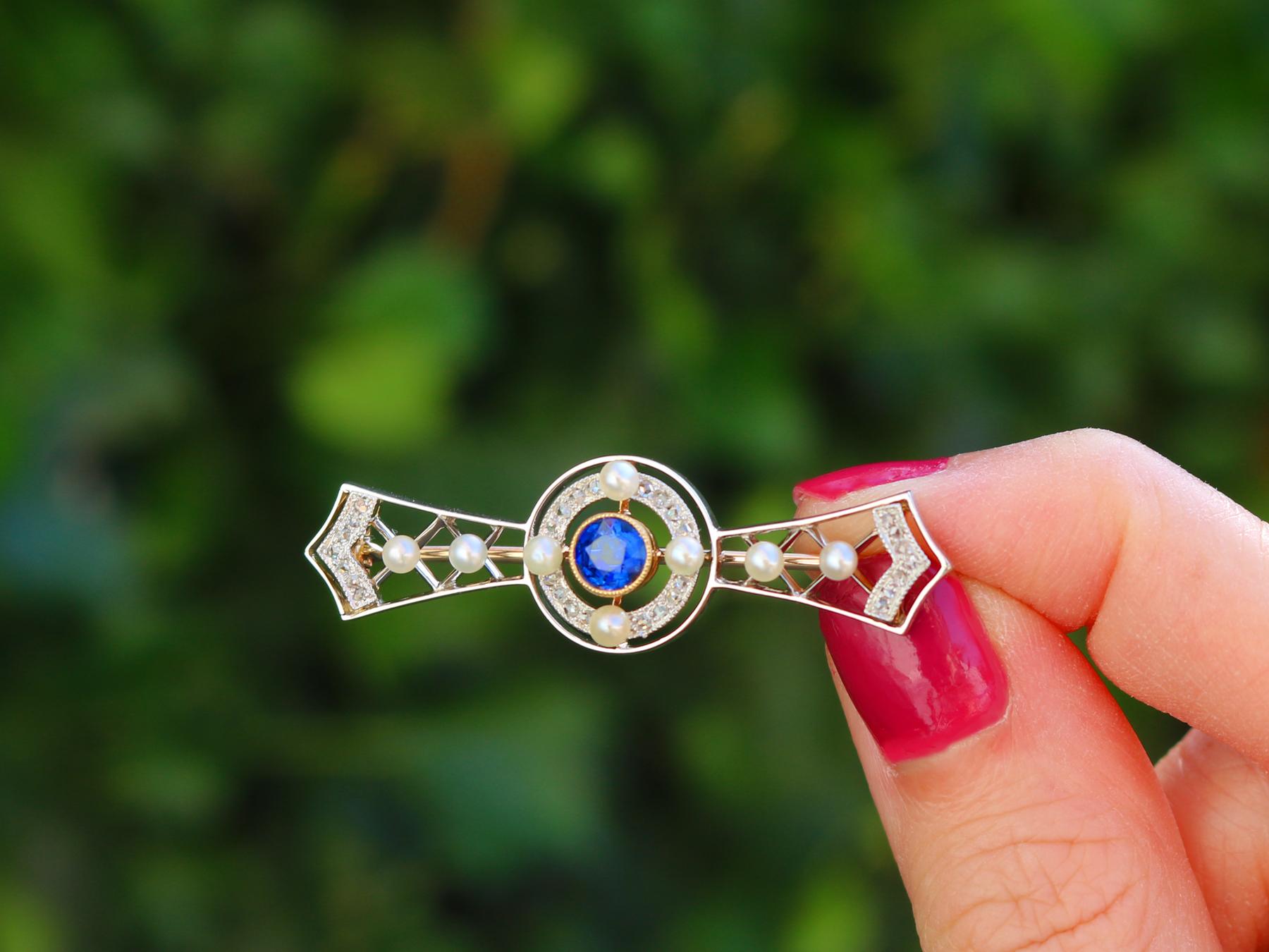 An exceptional, fine and impressive 0.64 carat sapphire, 0.20 carat diamond, seed pearl, 9 karat yellow gold and platinum brooch; part of our diverse antique jewelry and estate jewelry collections.

This exceptional, fine and impressive Edwardian