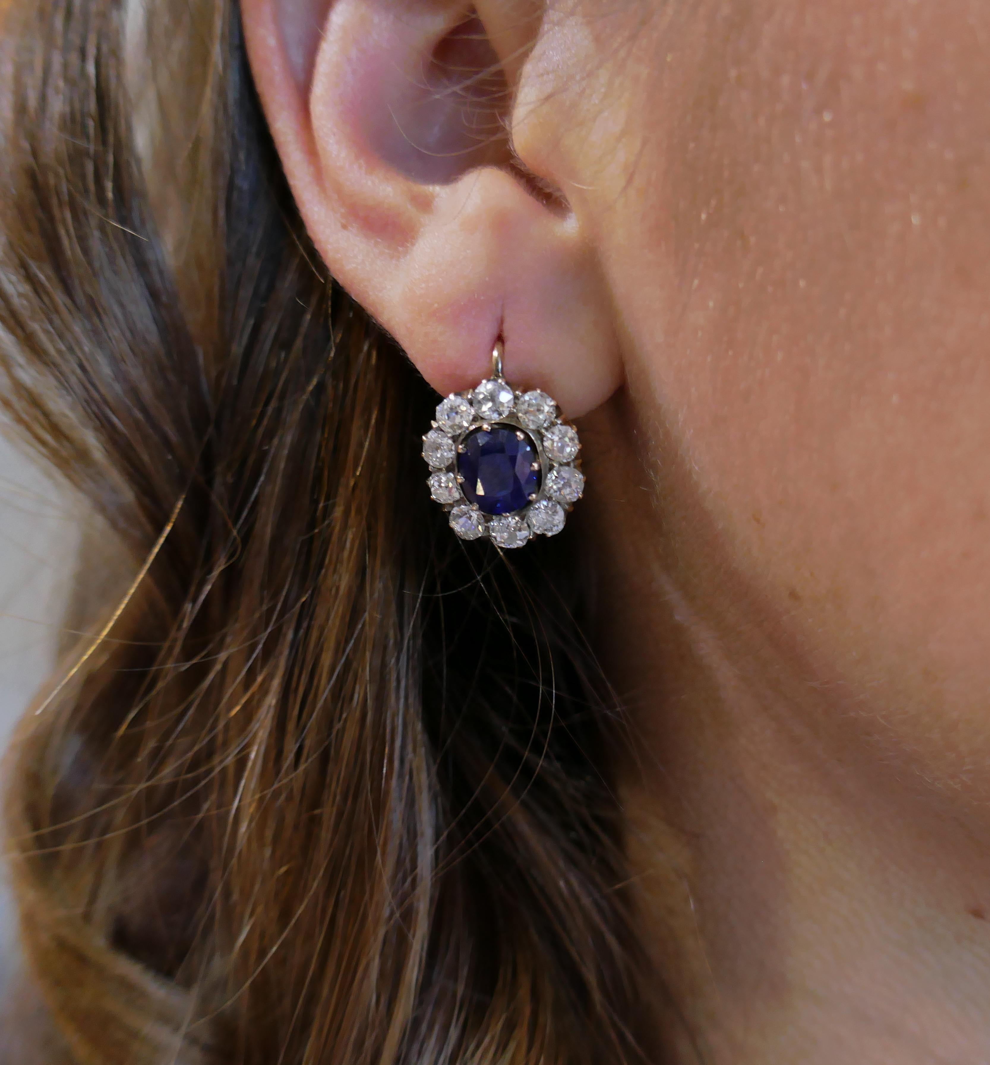 Gorgeous pair of Victorian cluster earrings featuring sapphires and diamonds. Classic and timeless earrings that are a great addition to your jewelry collection and definitely a family heirloom! 
The sapphires are oval faceted, total weight is