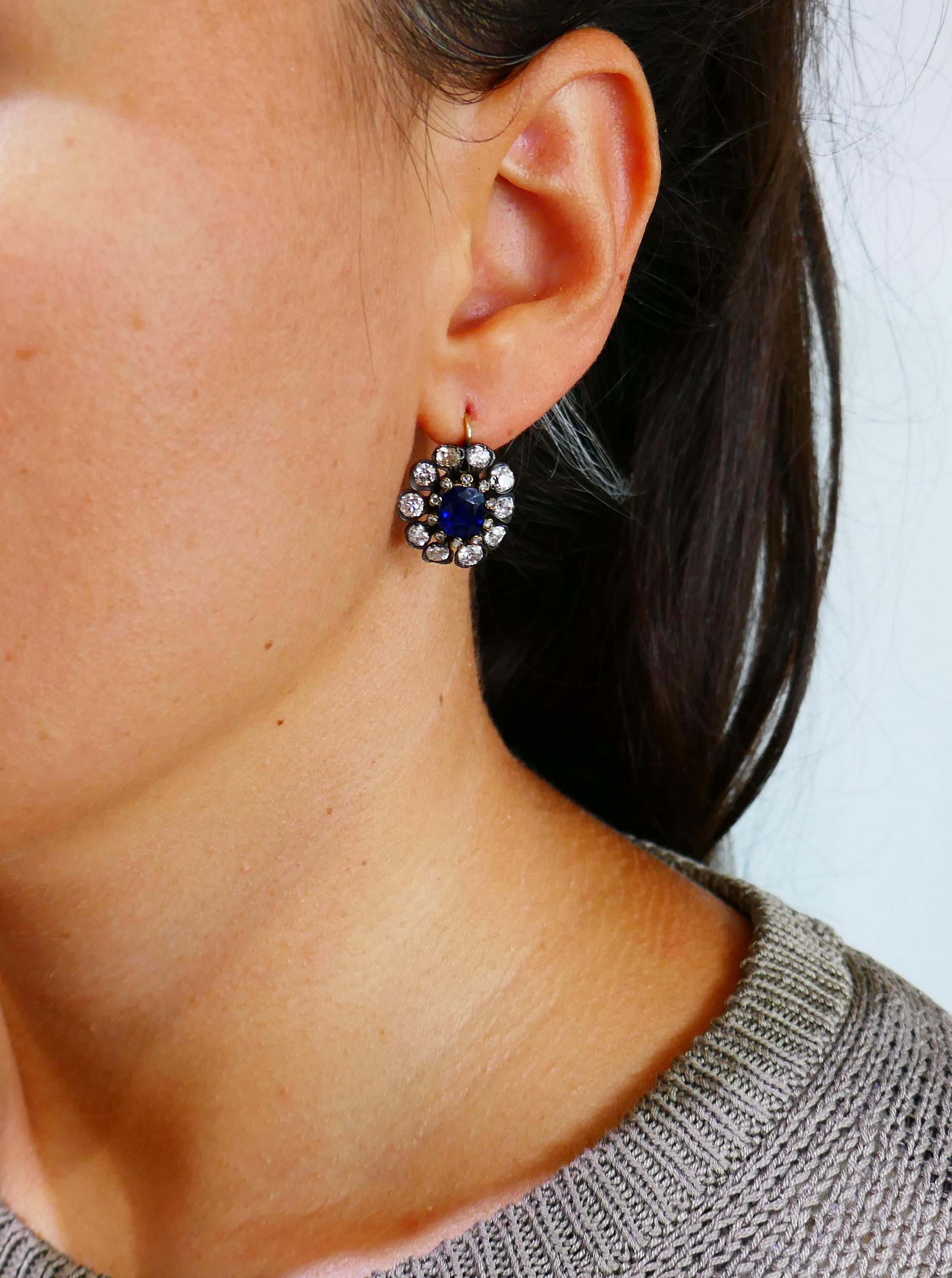 Gorgeous Victorian cluster earrings featuring finest quality sapphires and diamonds. Classic and timeless, the earrings are a great addition to your jewelry collection and will definitely become a family heirloom! 
The sapphires are oval faceted and