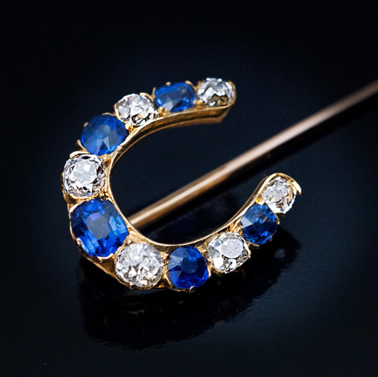 Alfiler antiguo de herradura de oro con zafiro y diamantes Talla antigua en venta