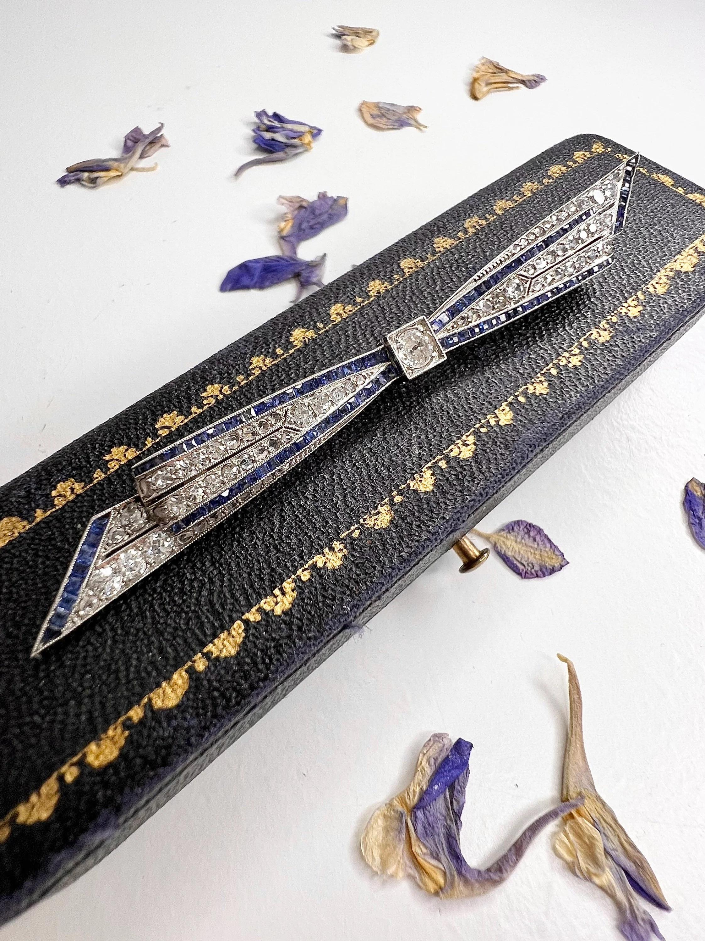 Women's or Men's Antique Sapphire & Diamond Platinum Bow Brooch For Sale