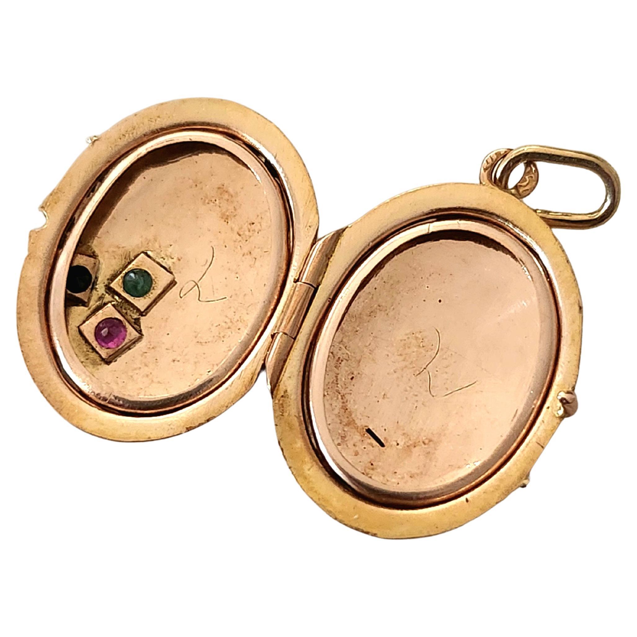 Antique imperial russian era 1900s gold locket pendant in 14k gold standard centered with natural sapphire emerald and ruby stones pendant lenght 3cm hall marked 56 imperial russian gold standard and initial maker mark in cyrtlic alphabet