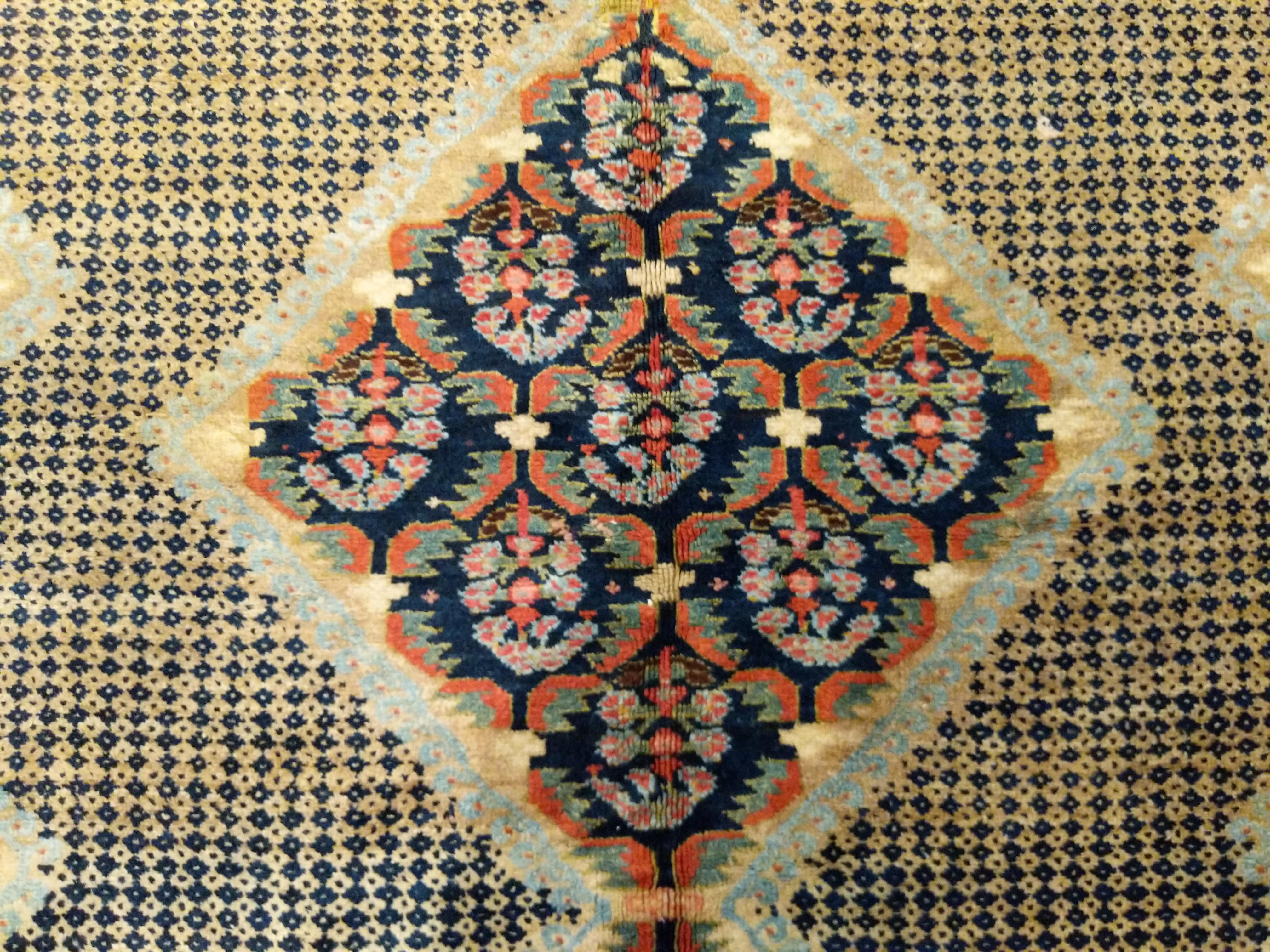 Late 19th Century Antique Sarab Camel Hair Rug with Paisleys and Dotted Motifs For Sale