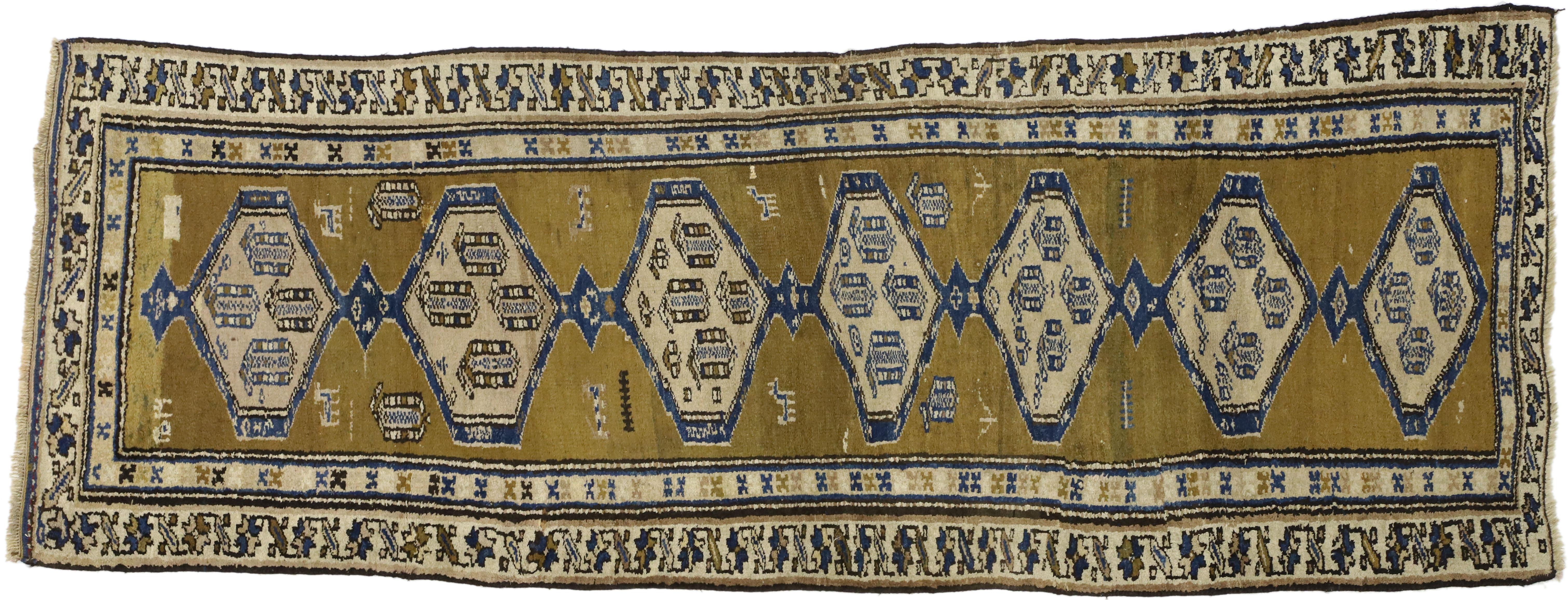 73198 Antique Sarab Persian Runner with Modern Tribal Style. This captivating antique Sarab Persian runner with modern tribal style features a warm composition highlighting its selection of high contrasting colors and rich waves of abrash. Seven