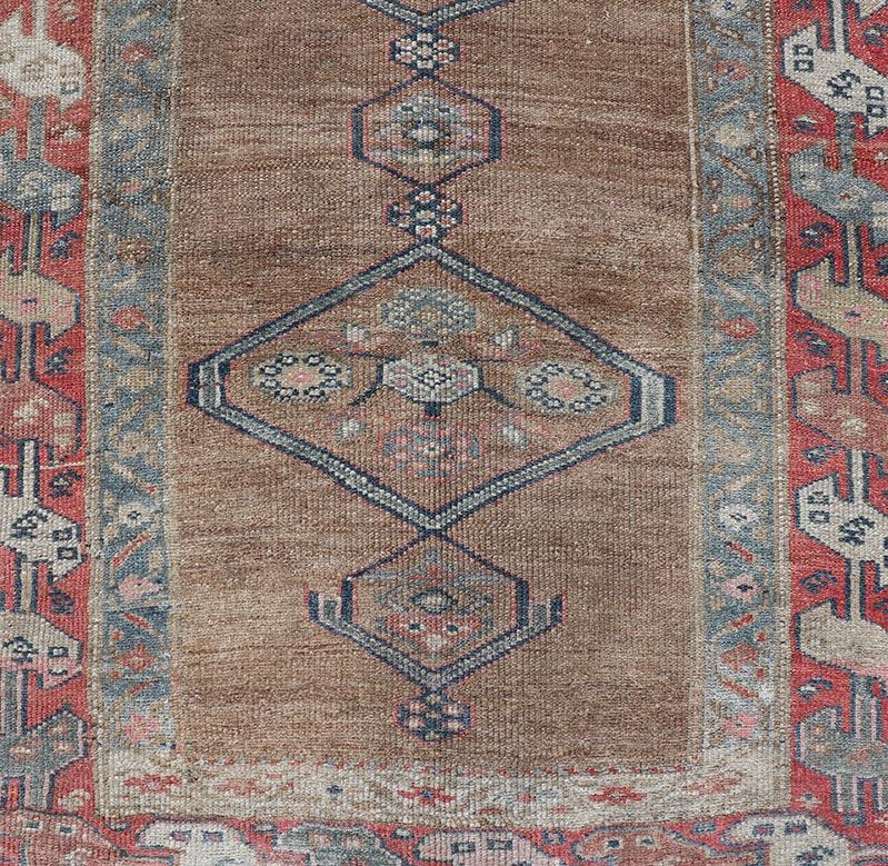 Persian Antique Sarab Runner with Sub-Geometric Medallion Design in Red, Blue & Brown For Sale