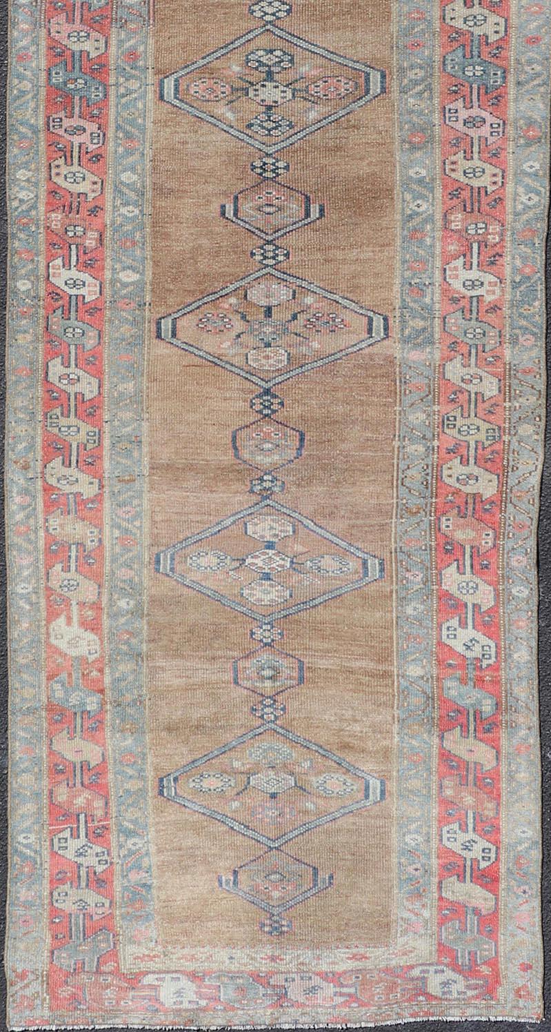 20th Century Antique Sarab Runner with Sub-Geometric Medallion Design in Red, Blue & Brown For Sale