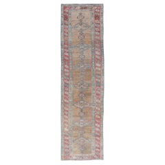 Antique Sarab Runner with Sub-Geometric Medallion Design in Red, Blue & Brown