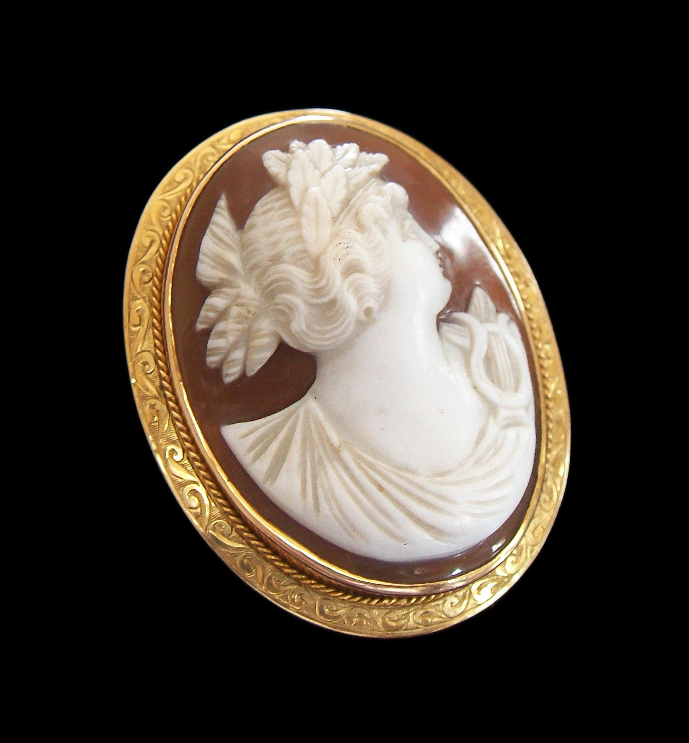 Victorian Antique Sardonyx Shell & Gold 'Erato' Cameo Brooch/Pendant - U.S.A., Circa 1900 For Sale