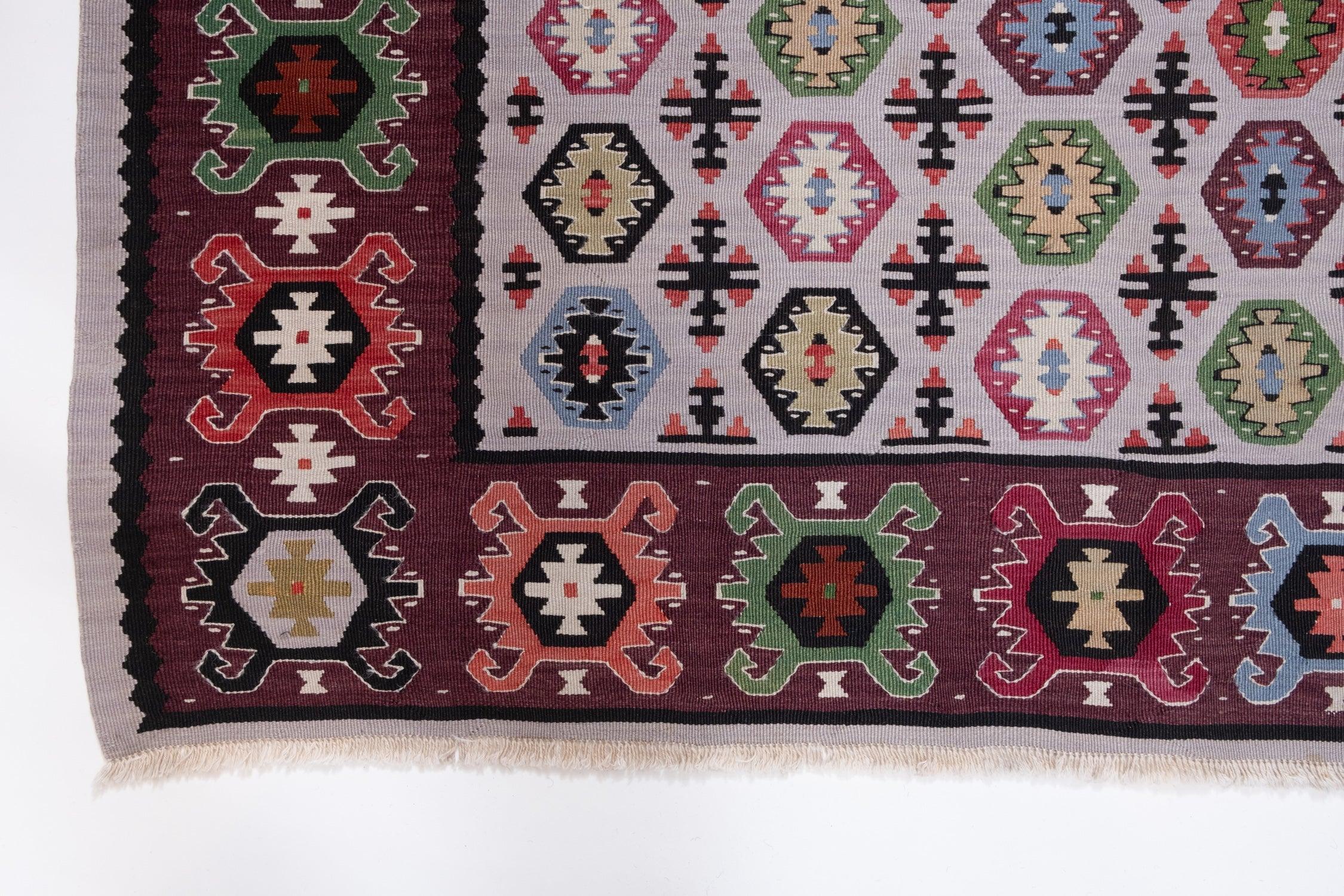 This is an Antique & Unique Sarkoy (Sharkoy or Şarköy) Kilim rug from Western Turkey with a rare and beautiful color composition.

Sarkoy kilims are very finely woven in slitweave in a variety of sizes and are made in one piece. Many feature the