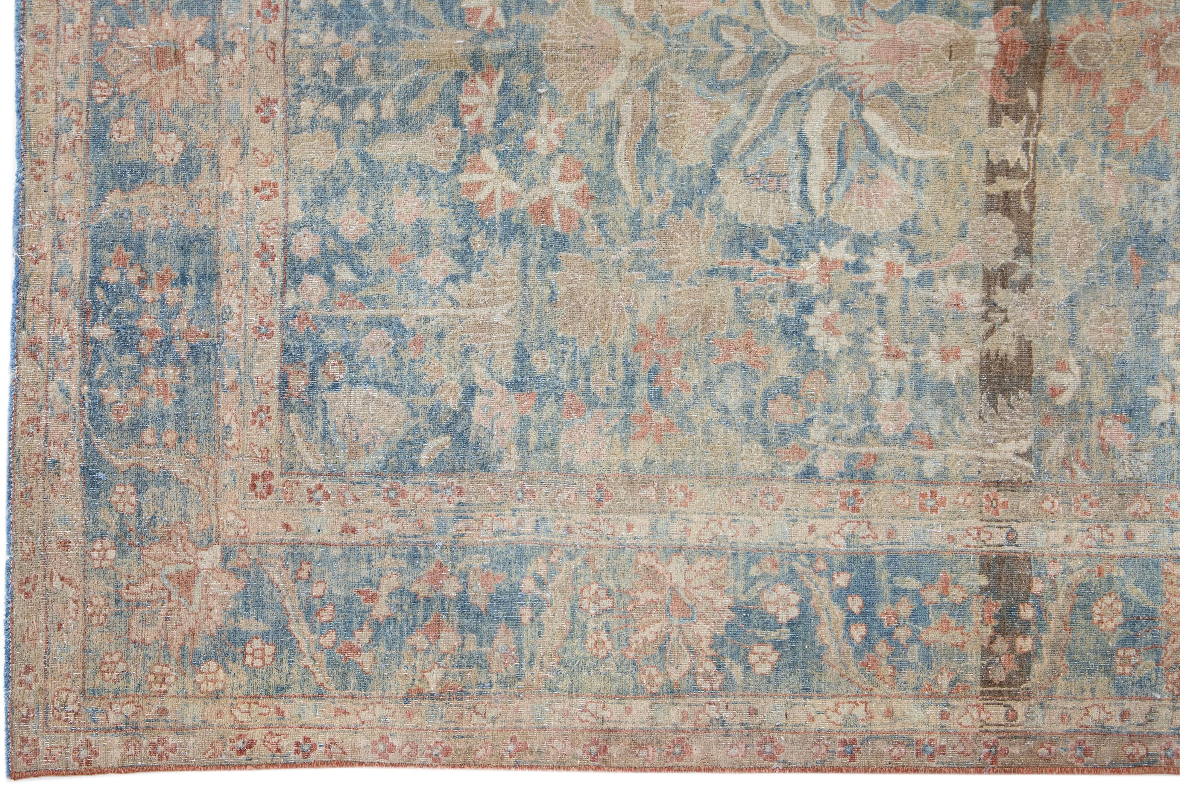 20th Century Antique Sarouk Farahan Blue Handmade Persian Wool Rug With Floral Motif For Sale