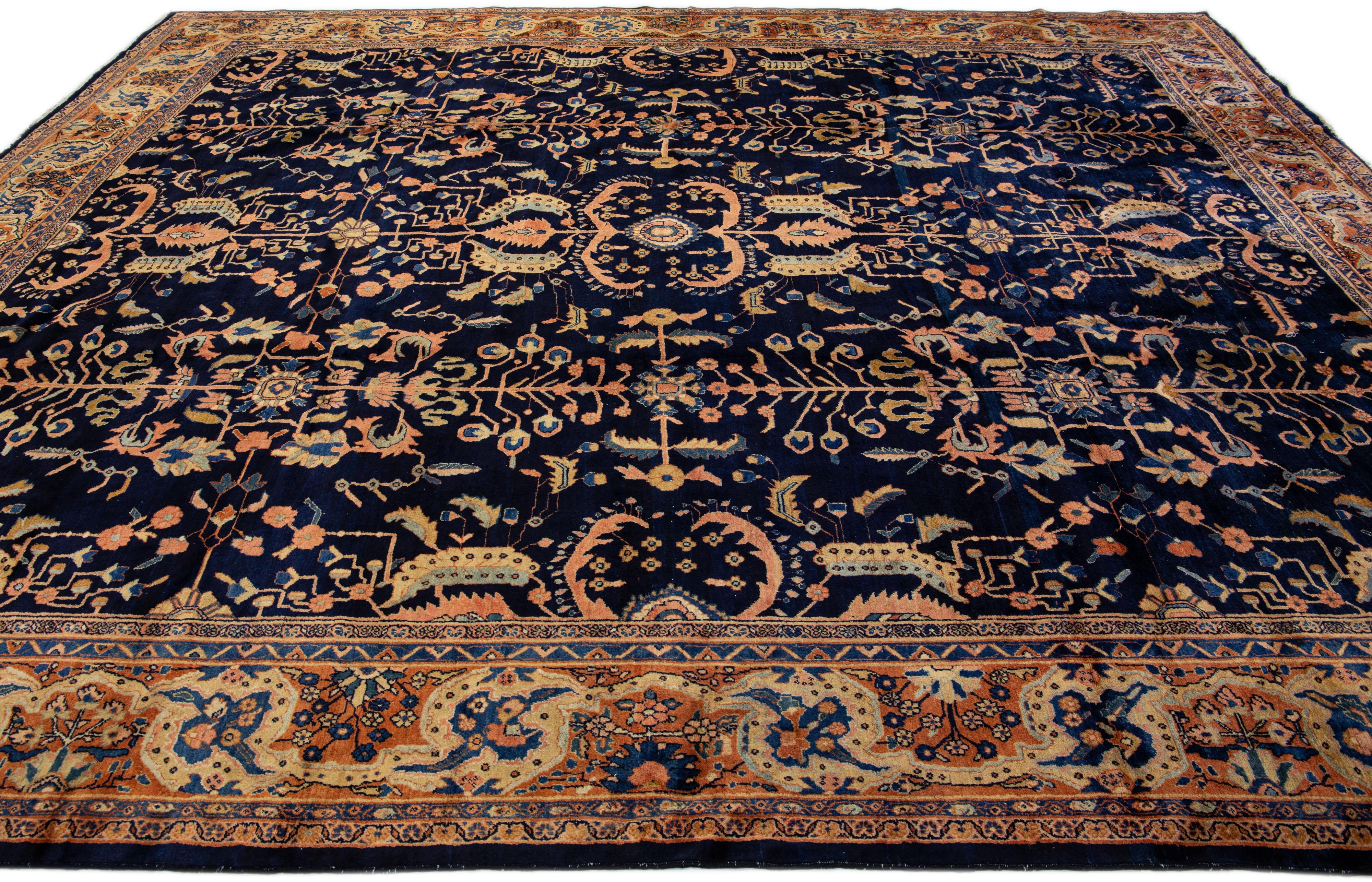 20th Century Antique Sarouk Farahan Handmade Dark Blue Persian Wool Rug with Floral Pattern For Sale