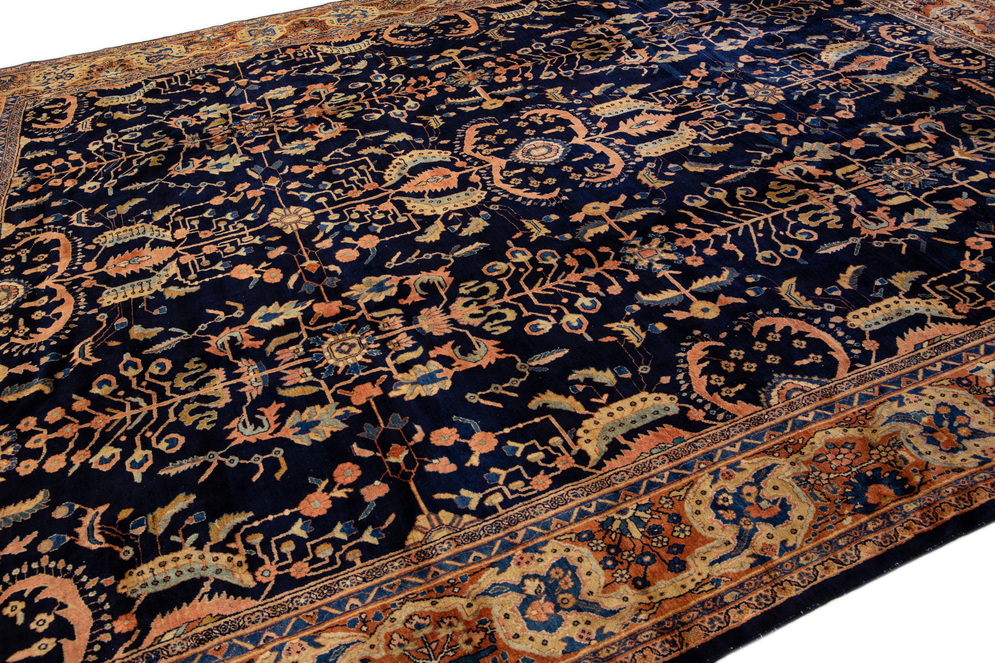Antique Sarouk Farahan Handmade Dark Blue Persian Wool Rug with Floral Pattern For Sale 1
