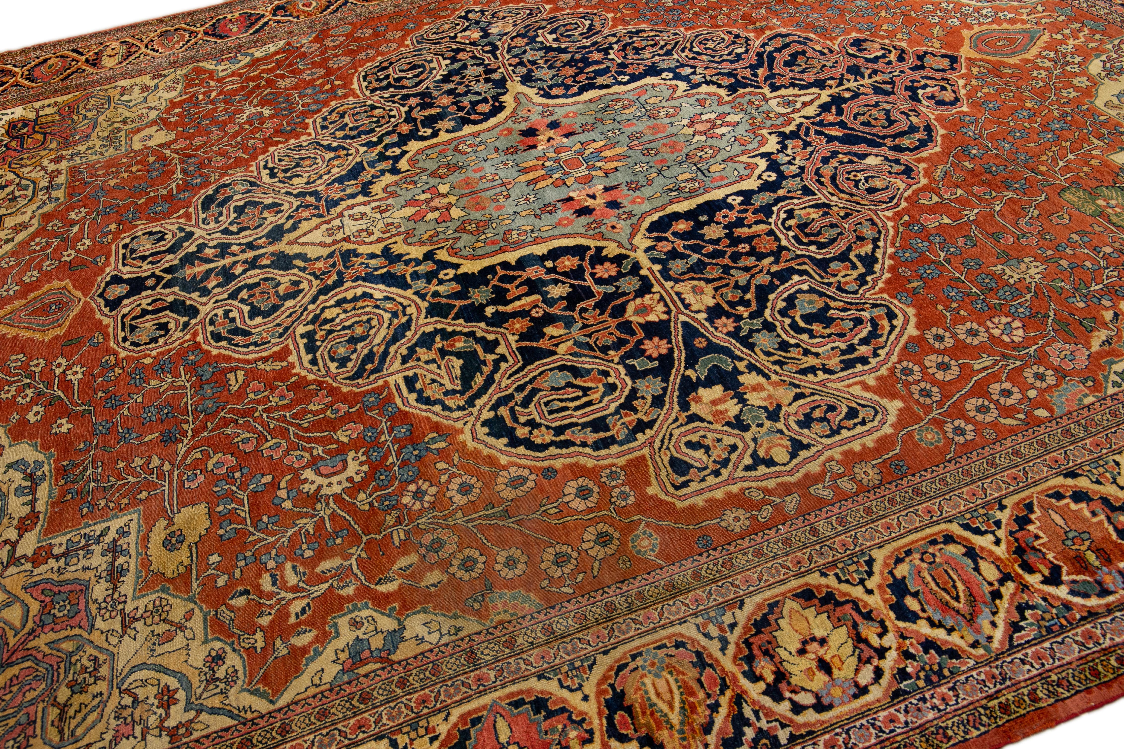 Tapis persan ancien Sarouk Farahan fait à la main à motif de médaillons rouille en vente 2