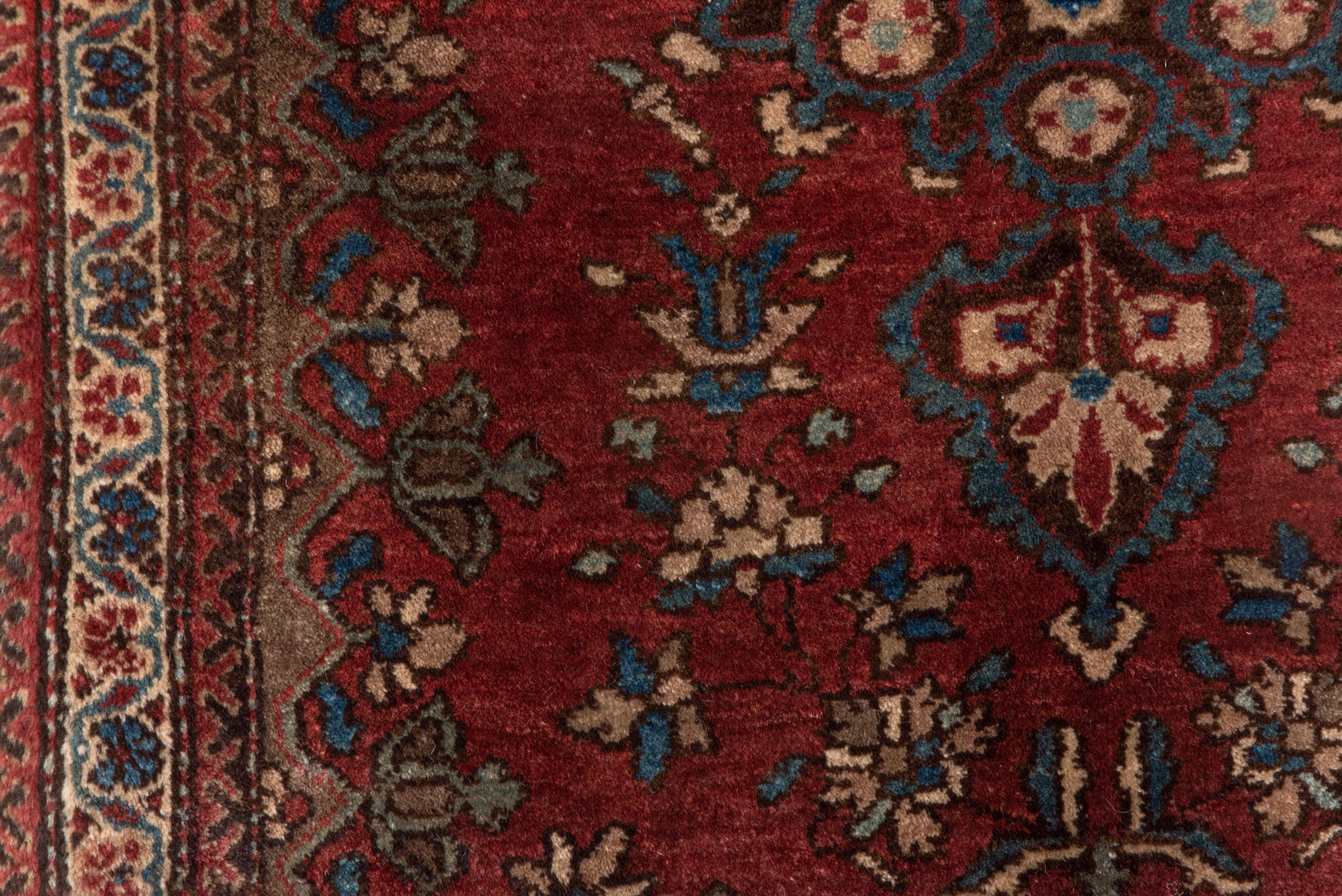 Wool Antique Sarouk in Rusted Red and Aesthetic Fades Throughout For Sale