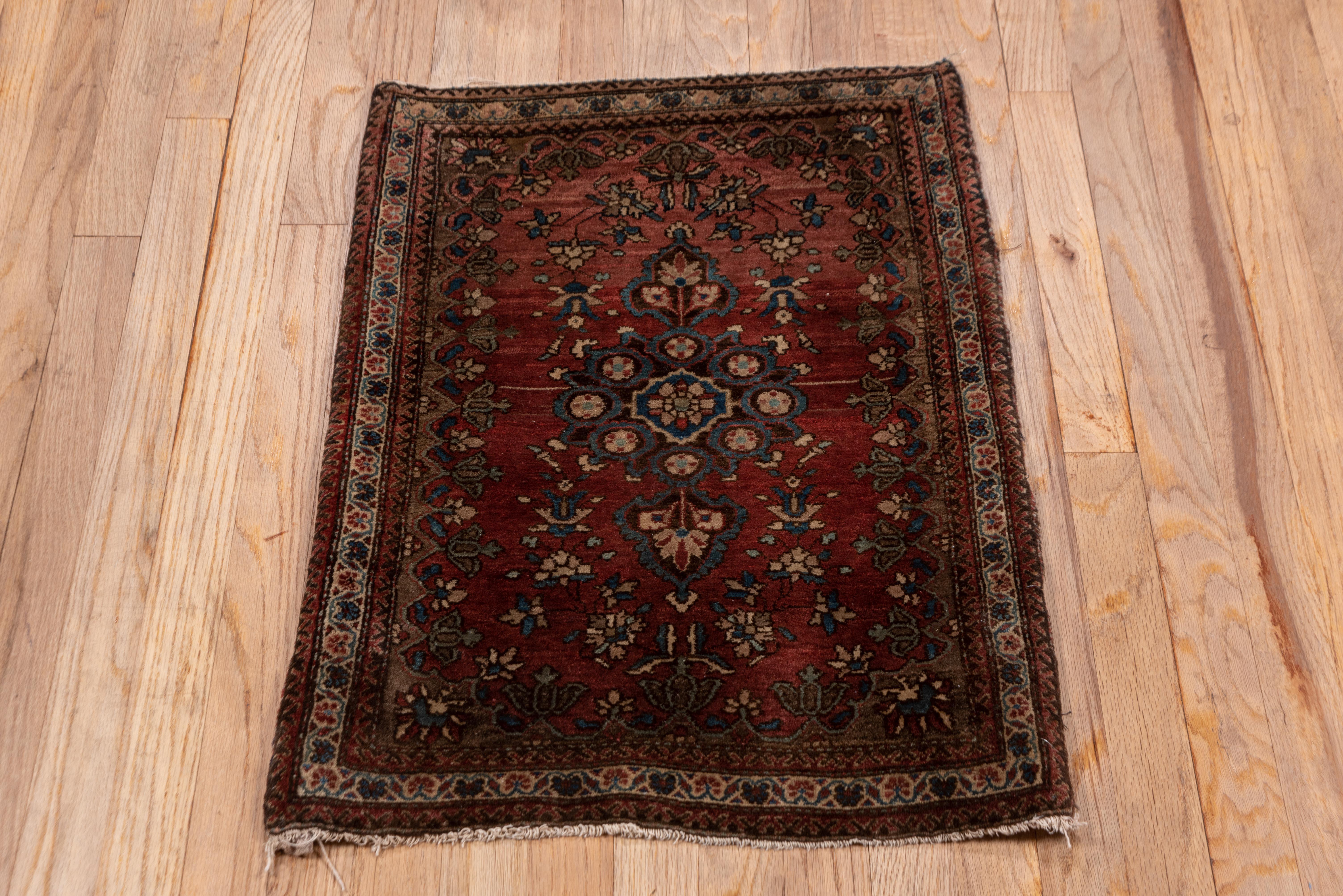Antique Sarouk in Rusted Red and Aesthetic Fades Throughout For Sale 2